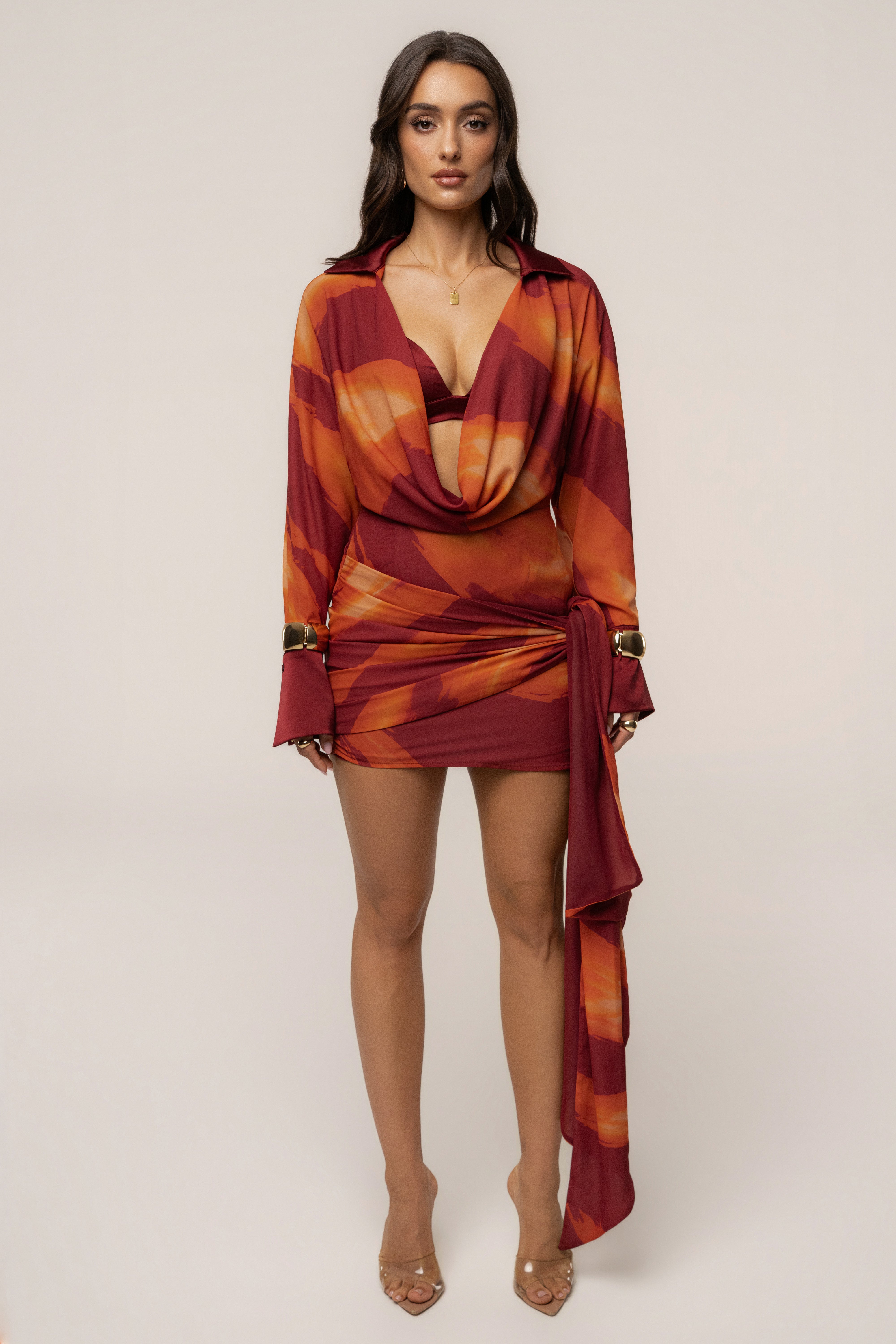 Crimson Dusk Midnight Confidence Mini Dress by JLUXLABEL, featuring a sleek design and deep red color, displayed on a mannequin.