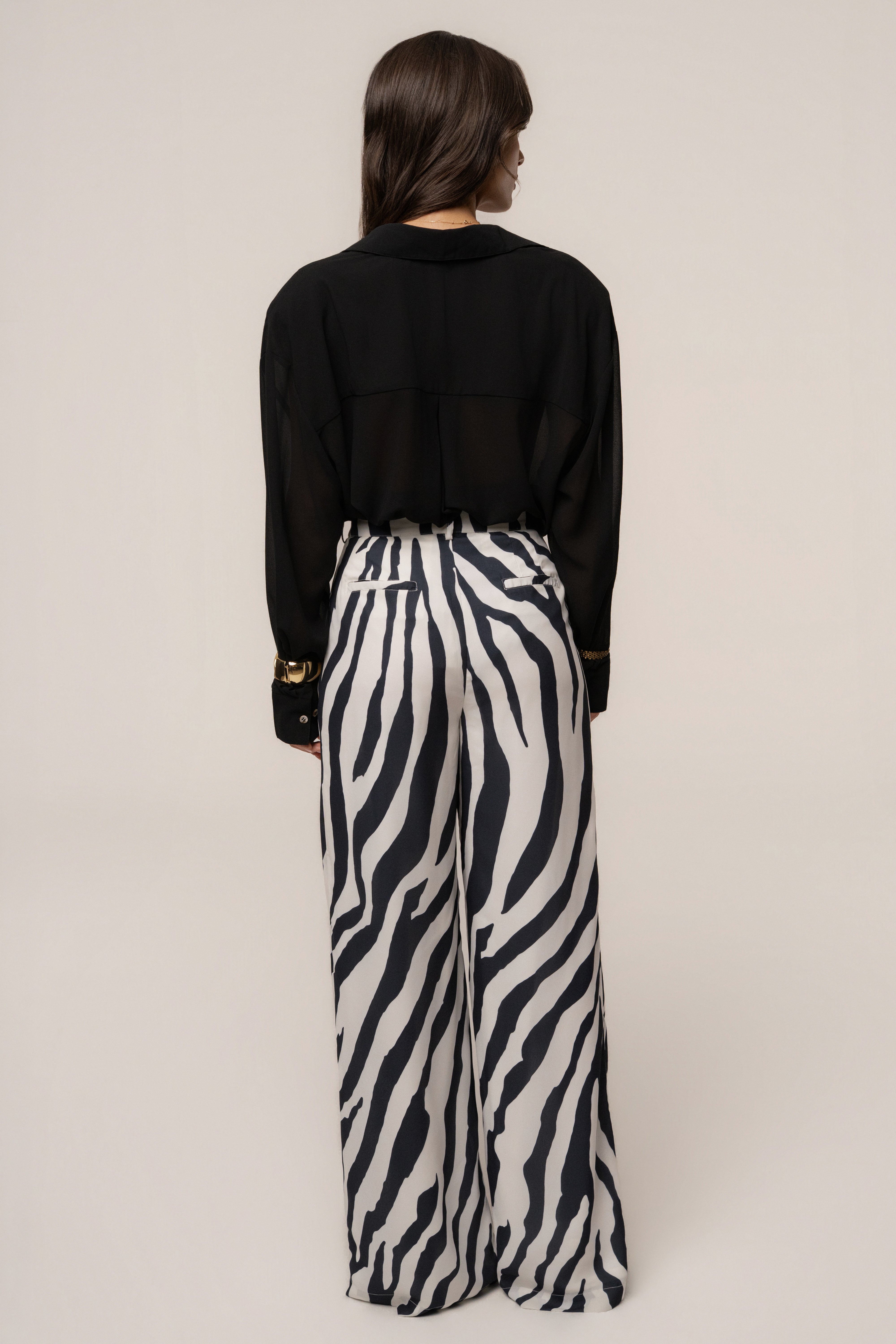 Black Fierce Form button-down shirt by JLUXLABEL, featuring a sleek design and classic collar, displayed on a hanger.