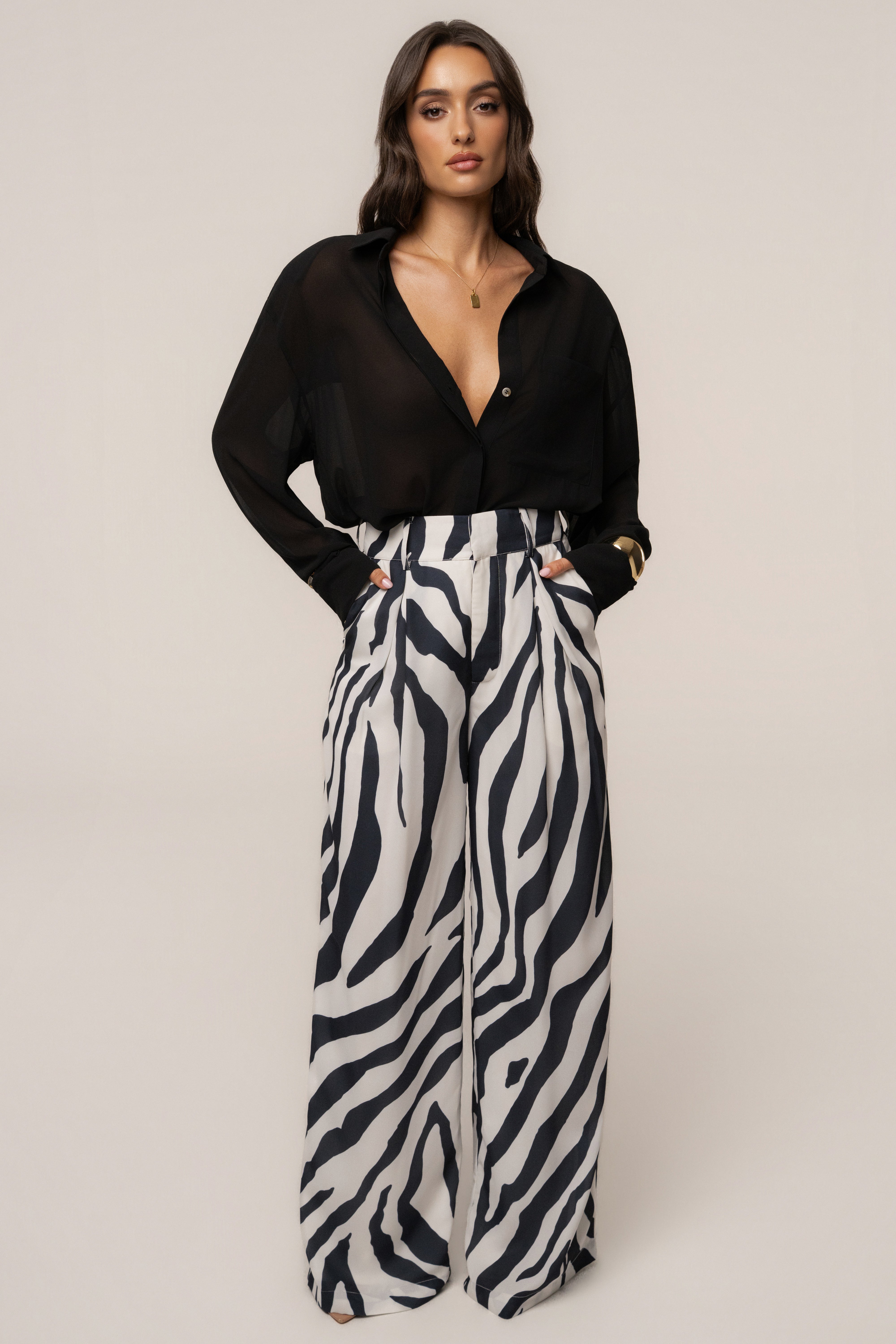 Navy zebra print soft pleated trousers from JLUXLABEL, featuring a relaxed fit and stylish design for casual or dressy wear.