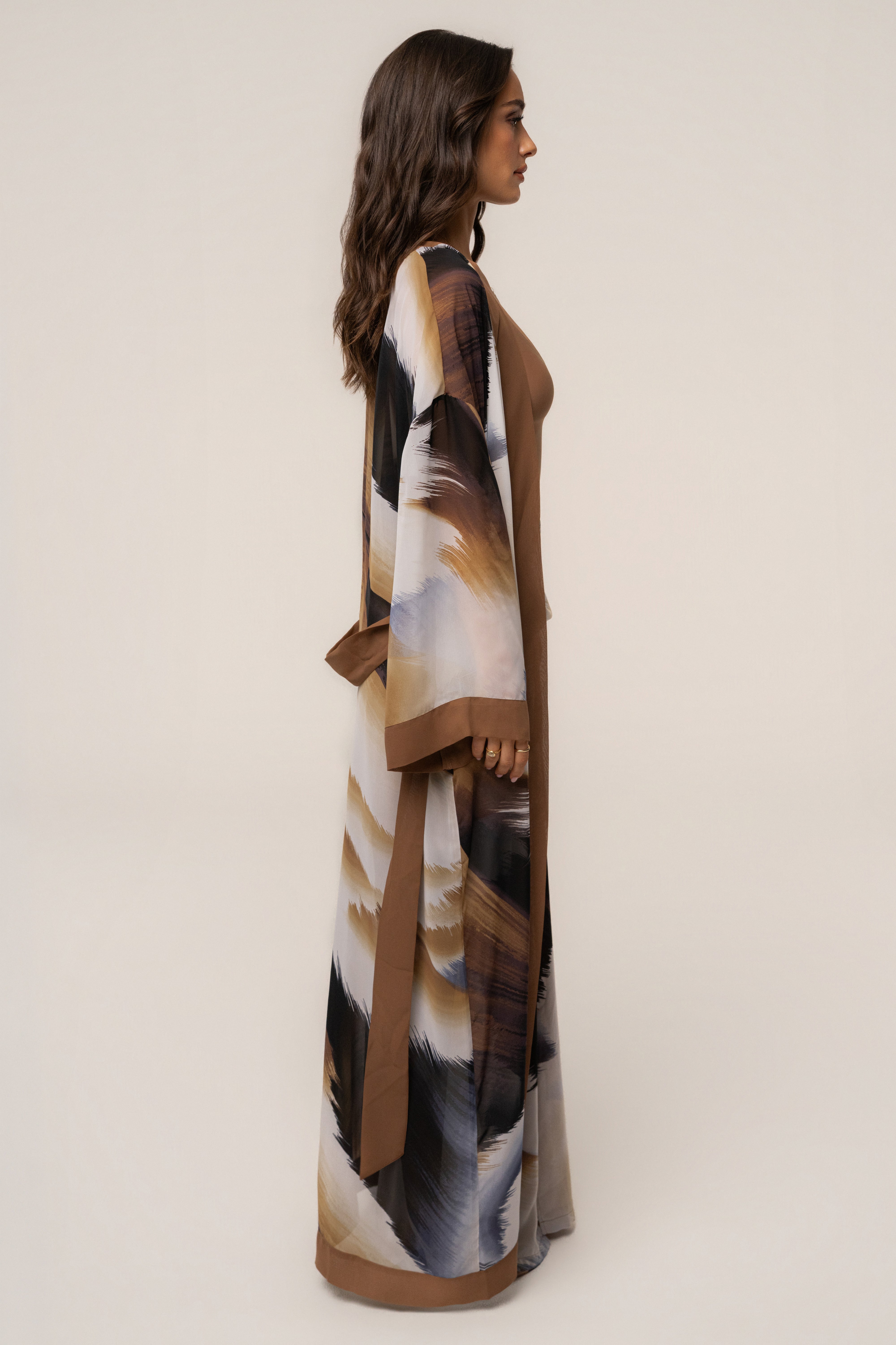 Brown abstract patterned duster coat by JLUXLABEL, lightweight outerwear with flowing fabric and stylish design.