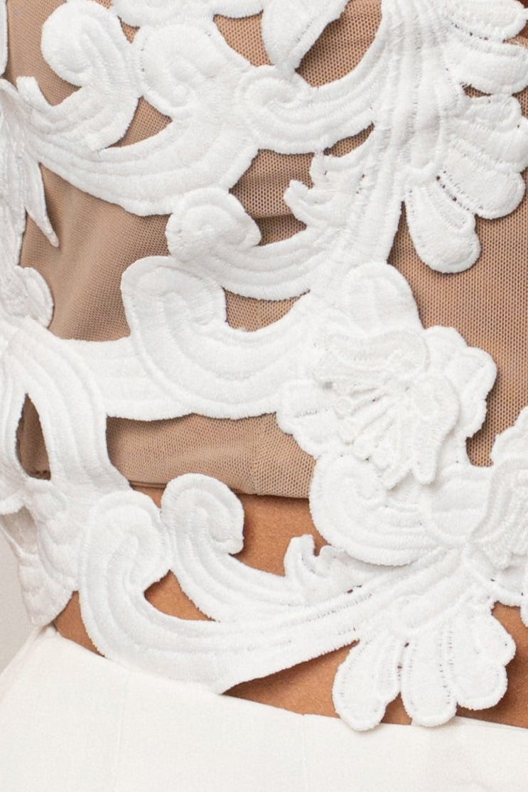 White Anahi embroidered top by JLUXLABEL, featuring intricate embroidery and a stylish, lightweight design.