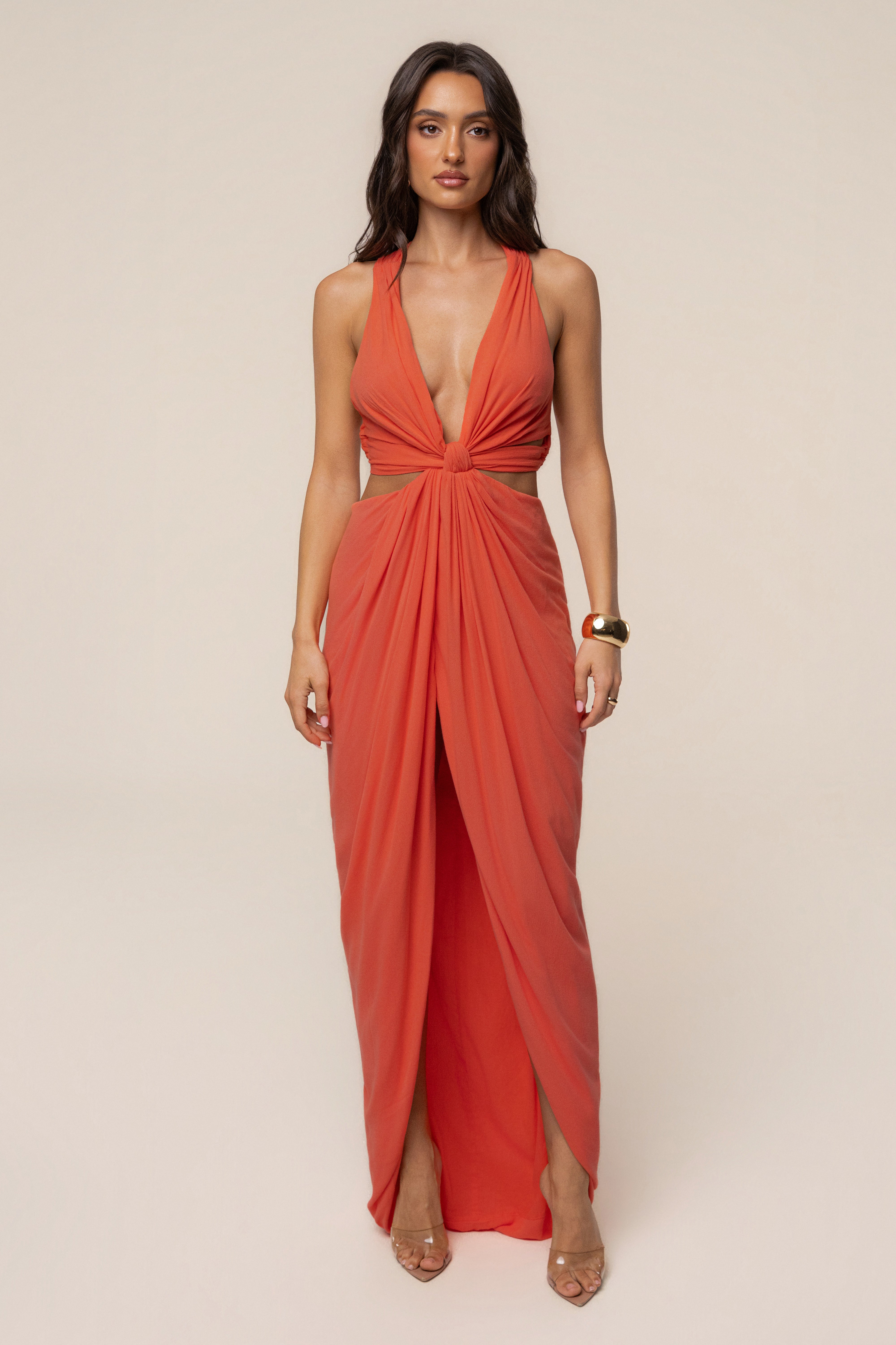 Coral warm sunsets maxi dress by JLUXLABEL featuring flowing fabric and vibrant sunset-inspired colors.