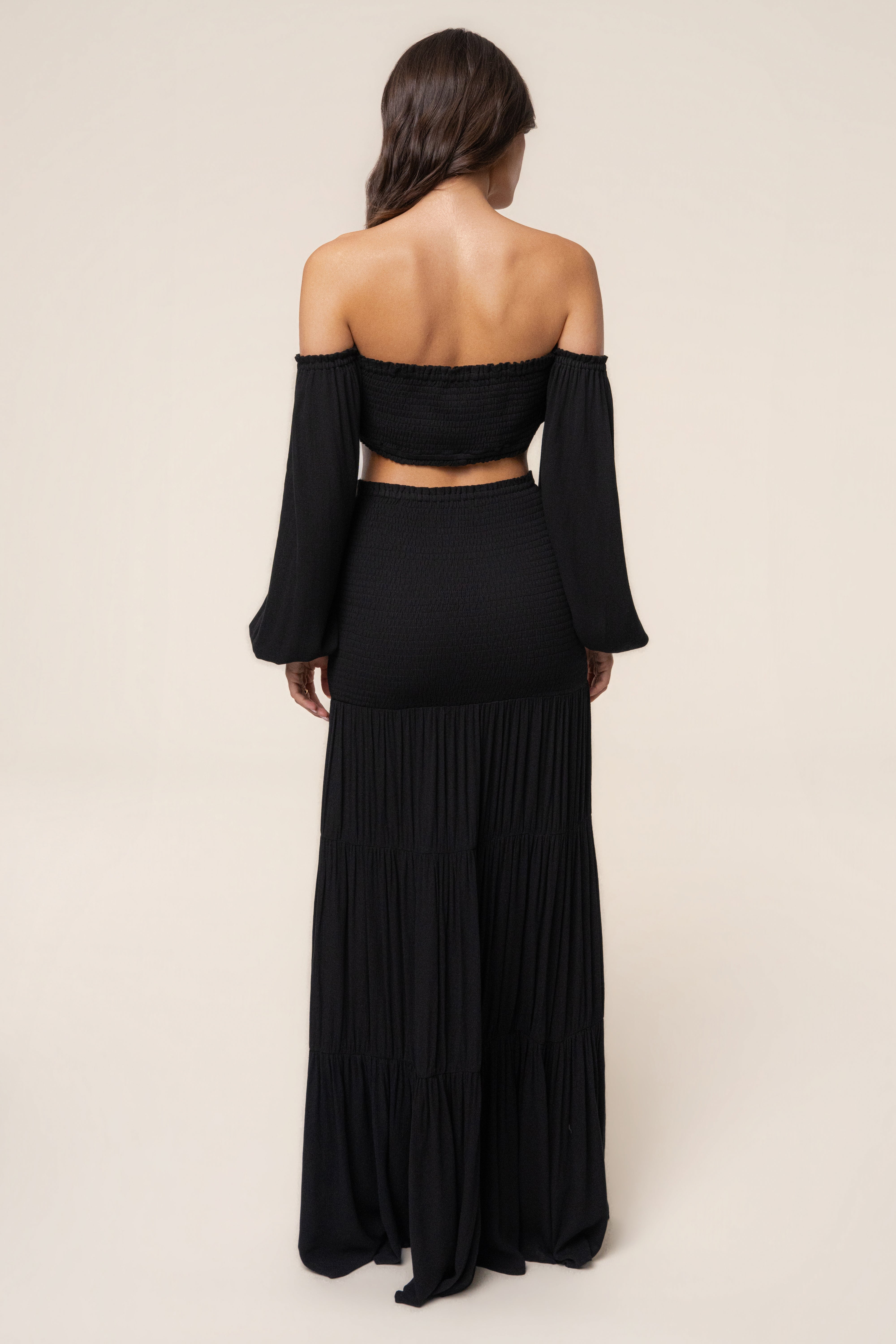 Black Solana skirt set by JLUXLABEL featuring a stylish skirt and matching top, perfect for casual or dressy occasions.