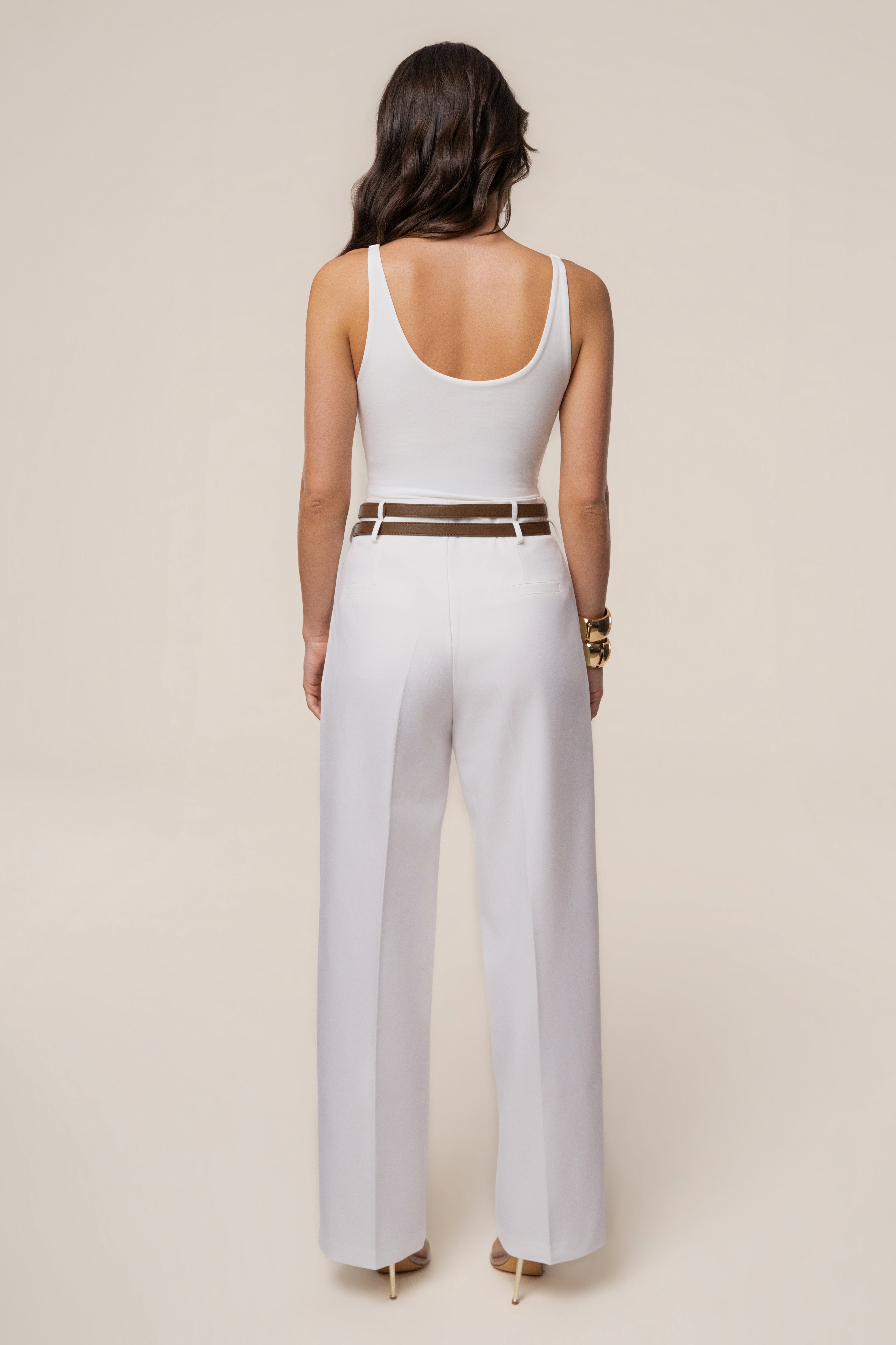 Ivory modern belted trousers by JLUXLABEL, stylish bottoms with a tailored fit and belt detail, perfect for contemporary outfits.