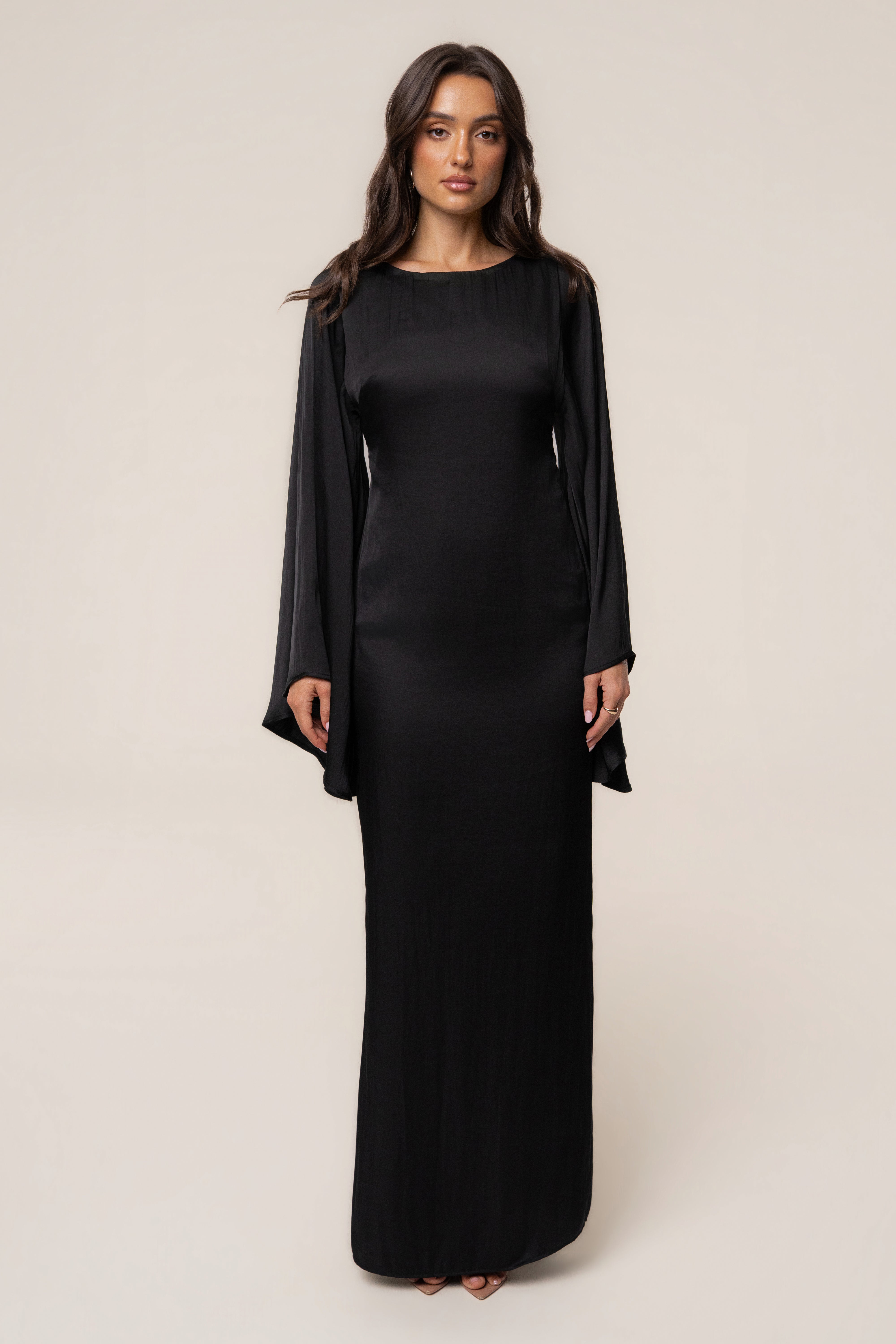 Black soft fabric maxi dress by JLUXLABEL featuring a flowing silhouette and elegant design, perfect for stylish occasions.
