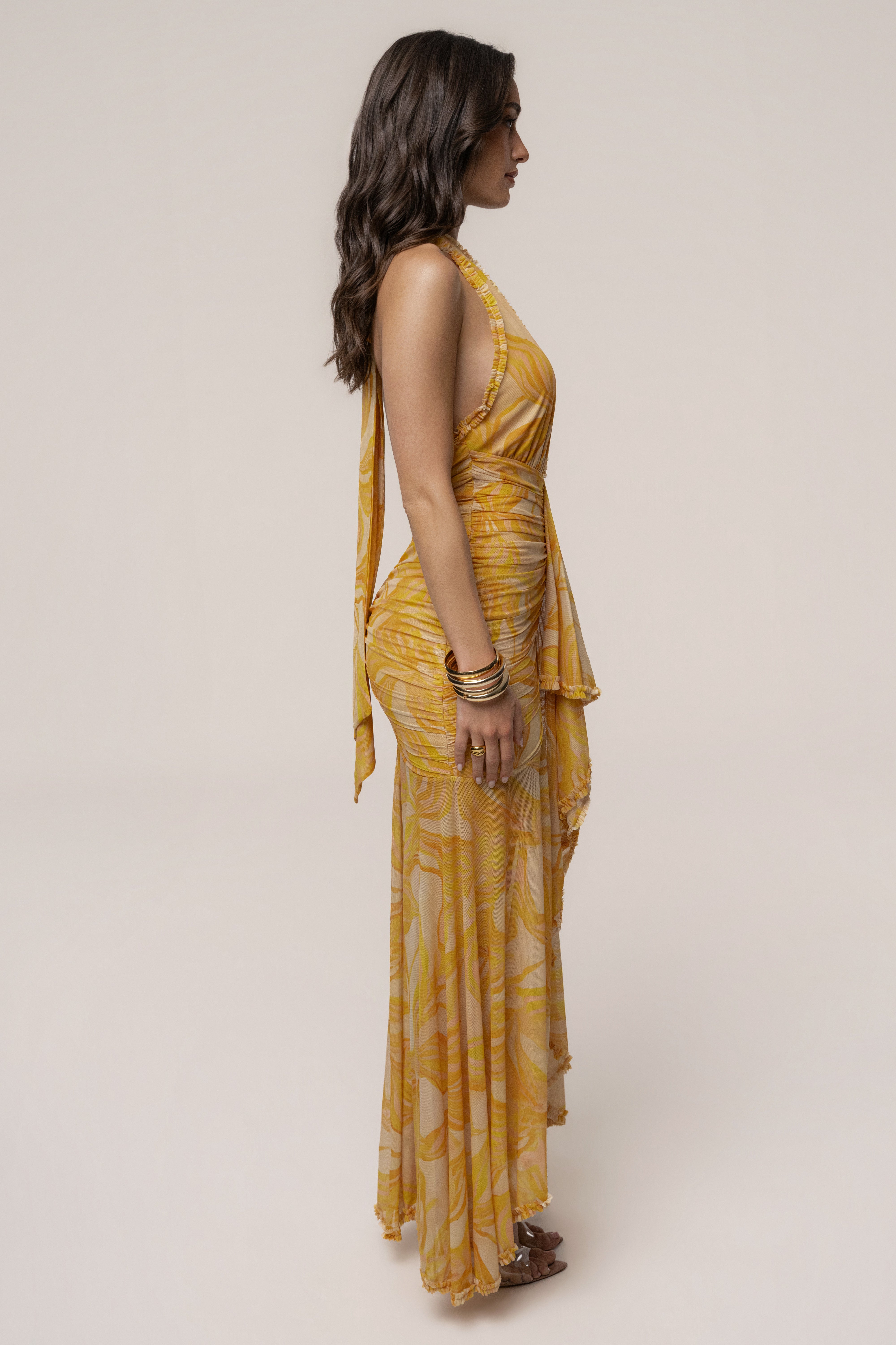 Yellow Paradise Glow maxi dress by JLUXLABEL, flowing fabric with a vibrant, summery design, perfect for warm-weather occasions.