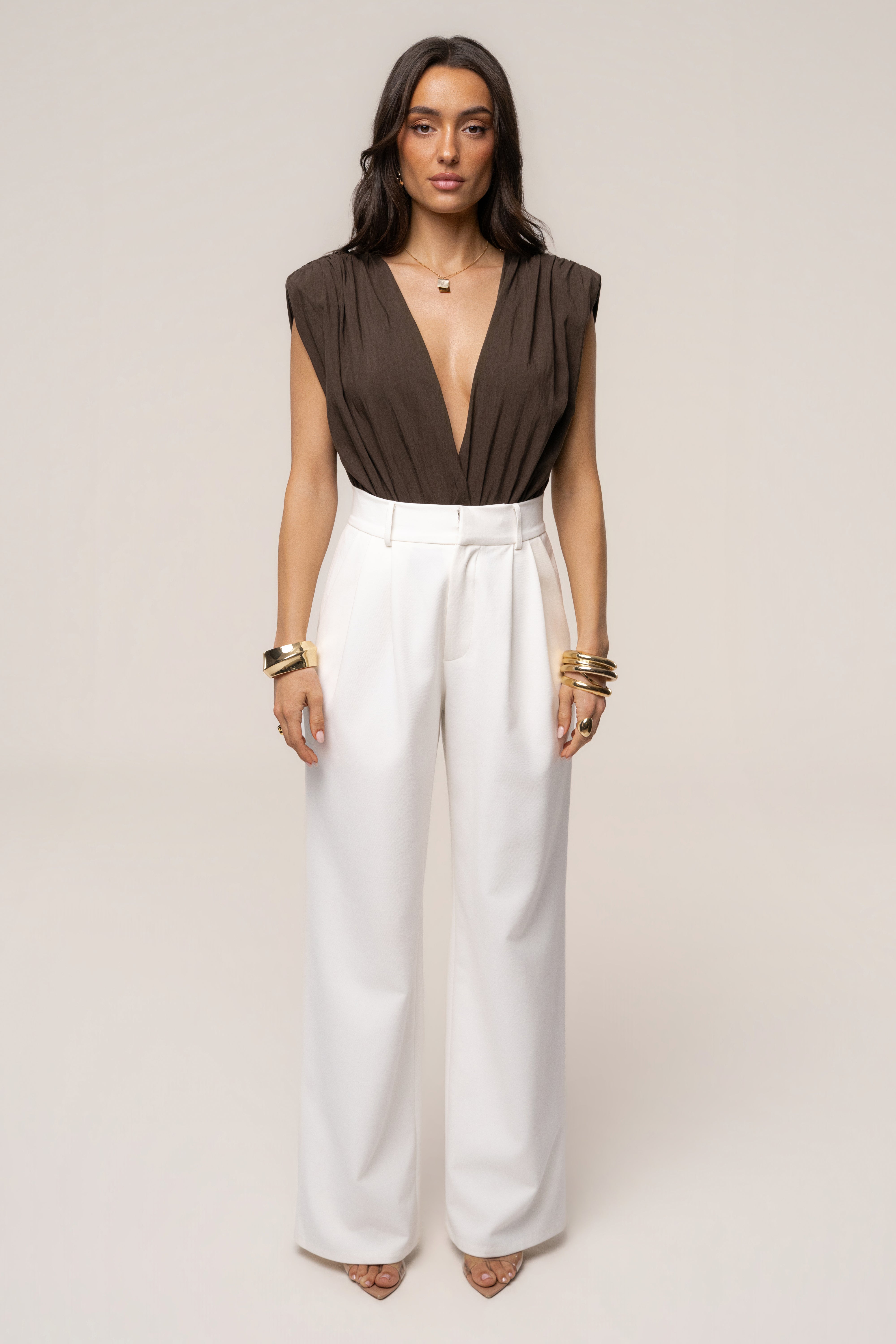Brown Solar Drift bodysuit from JLUXLABEL, stylish long-sleeve top with a fitted silhouette, perfect for casual or chic outfits.