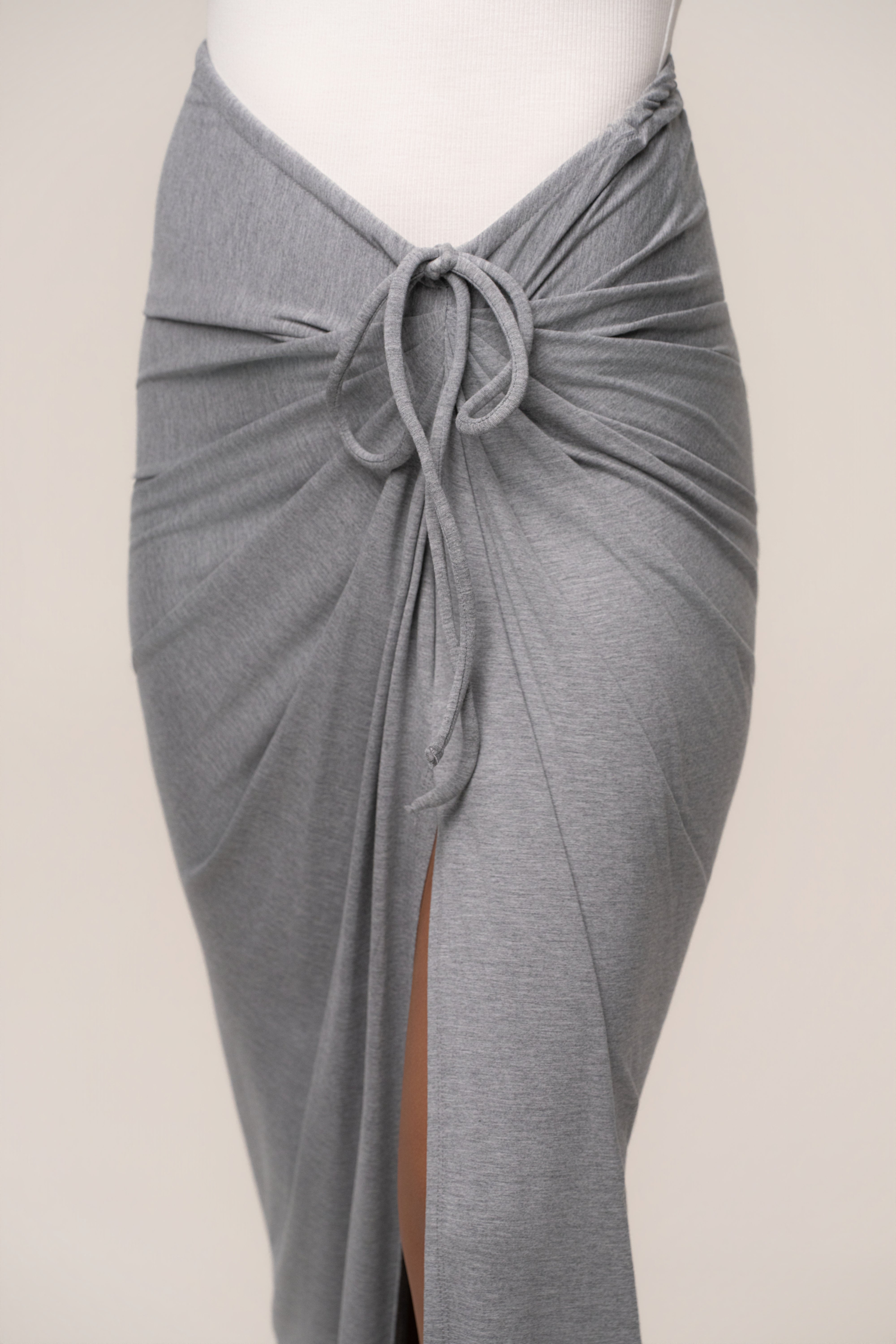 Heather grey Island Drape maxi skirt from JLUXLABEL, featuring a flowing drape and comfortable waistband, styled as casual bottoms.