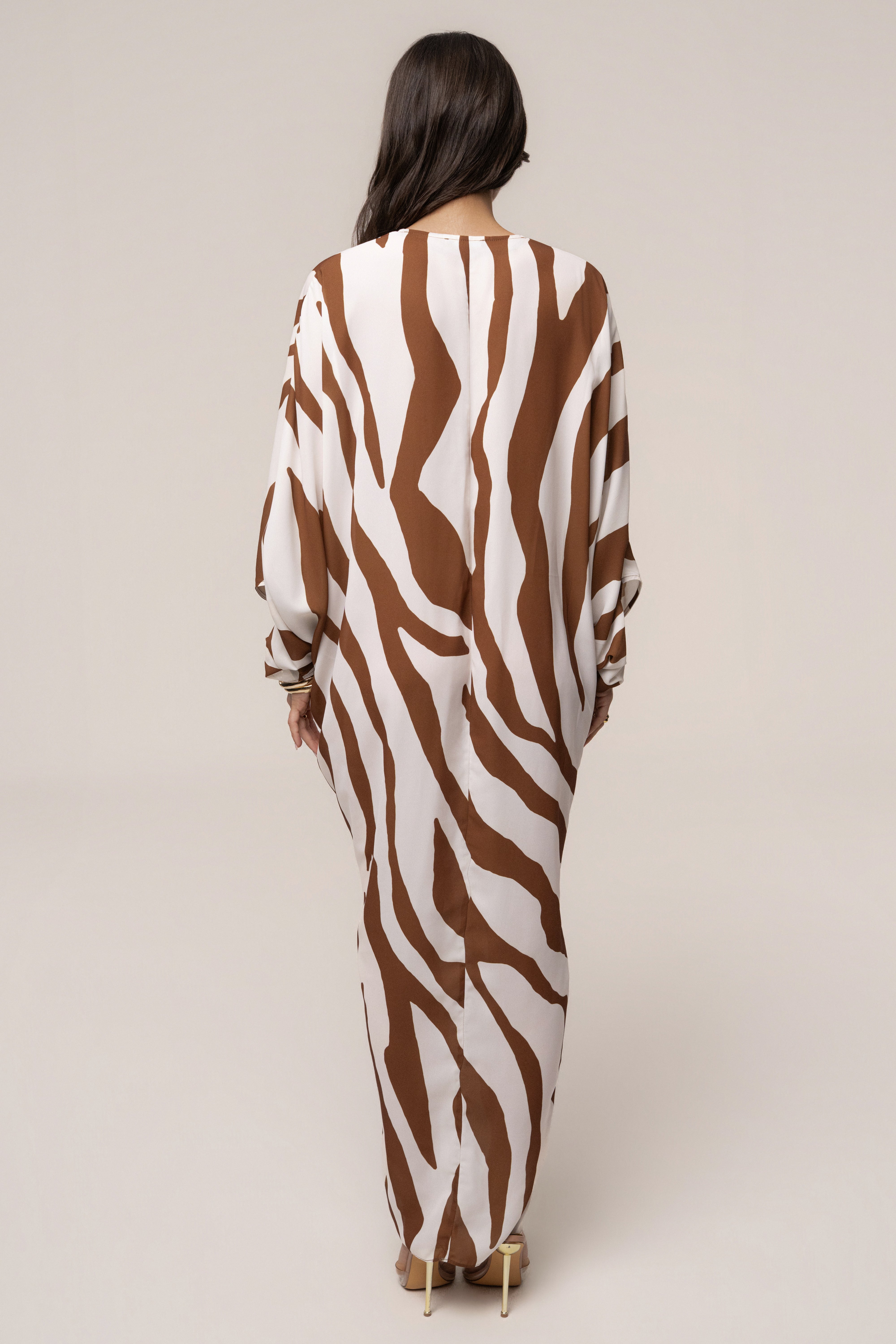 Brown Zebra Longer Days Cover Up Dress by JLUXLABEL, featuring a flowy design with zebra print fabric and long sleeves.