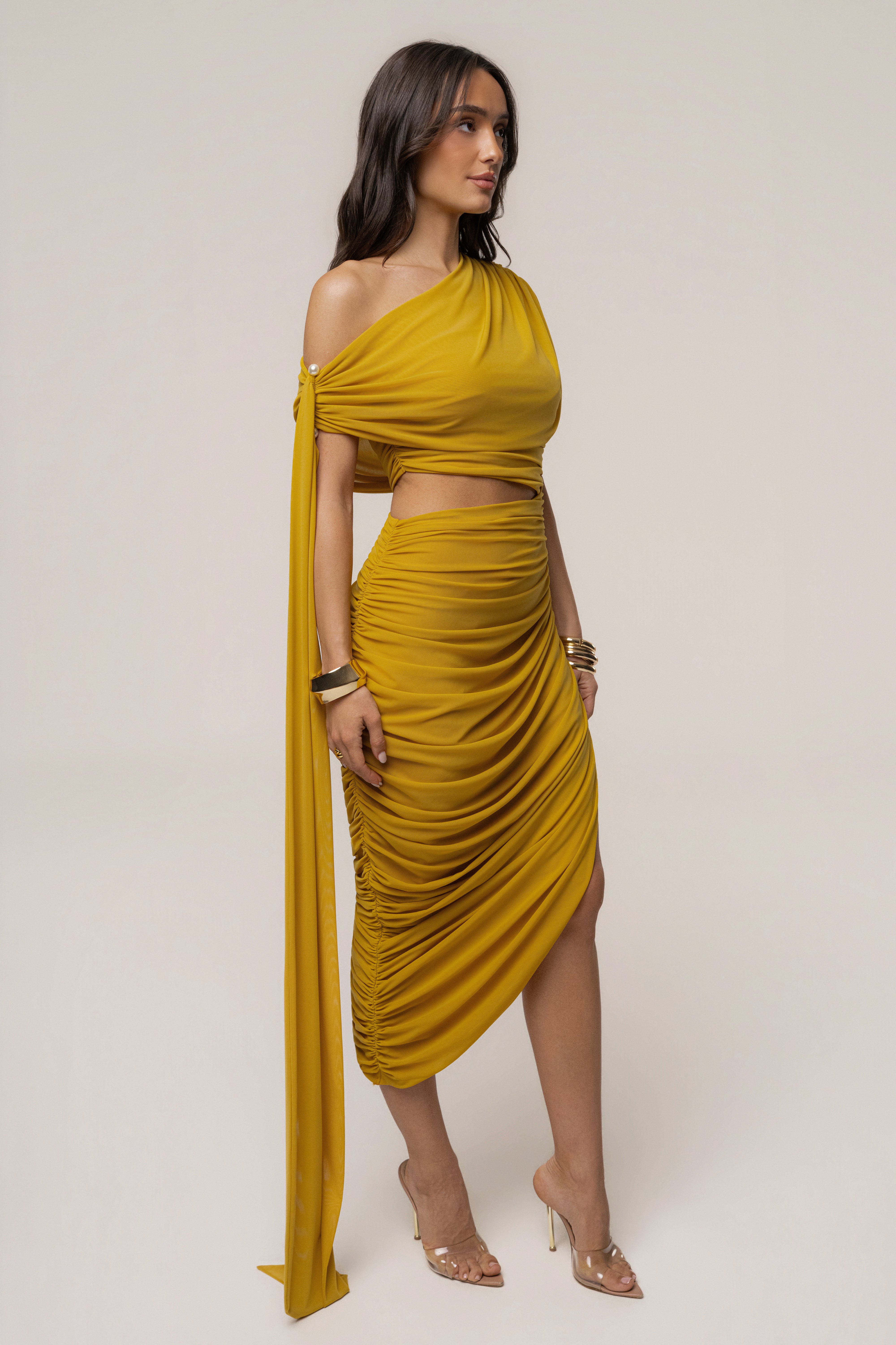 Mustard Aris cutout midi dress by JLUXLABEL featuring a stylish design with cutouts, perfect for chic daytime or evening wear.