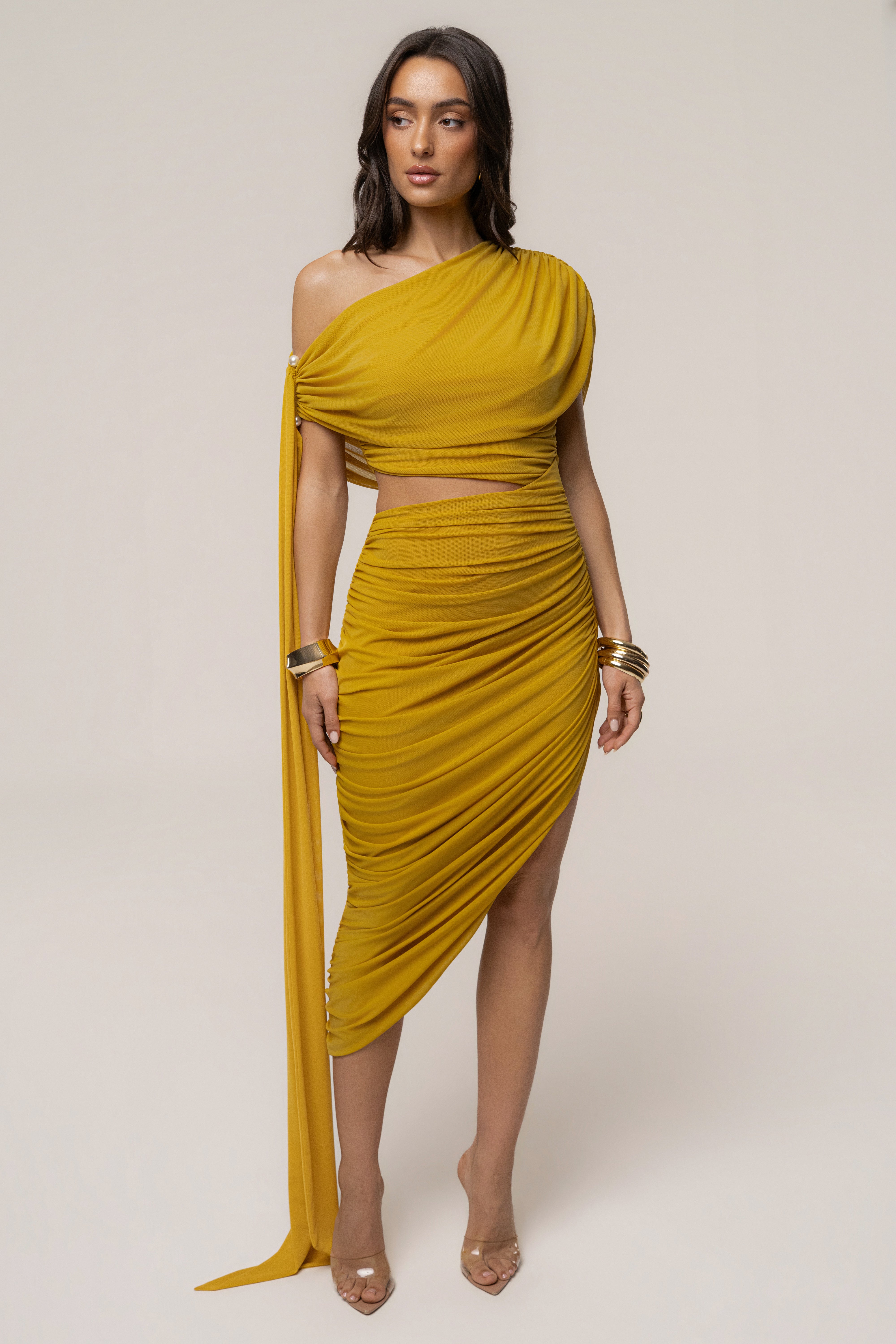 Mustard Aris cutout midi dress by JLUXLABEL featuring stylish design and elegant fit, shown against a neutral background.