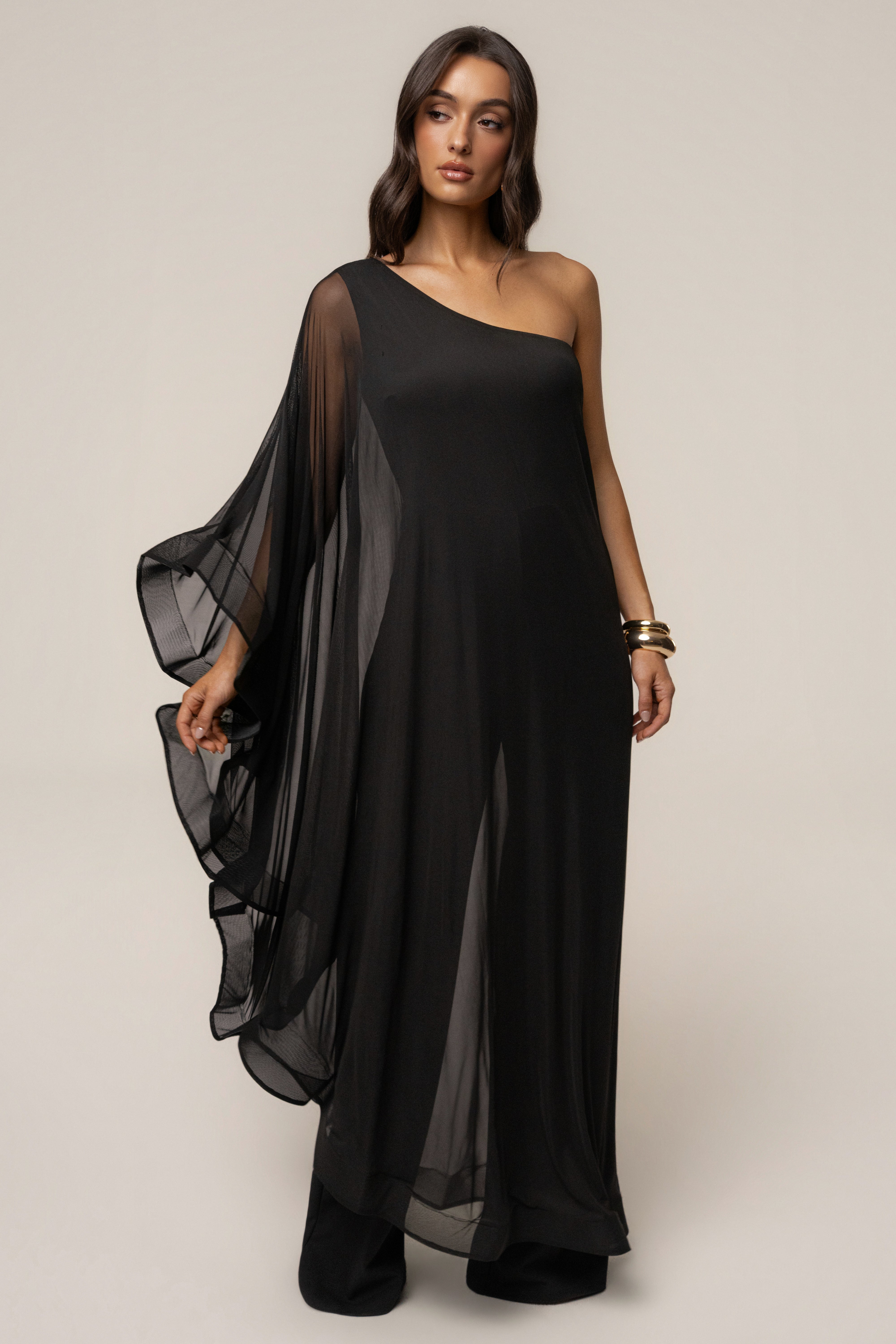 Black JLUXLABEL New Waves jumpsuit with wide legs and sleeveless design, displayed on a mannequin on a plain background.