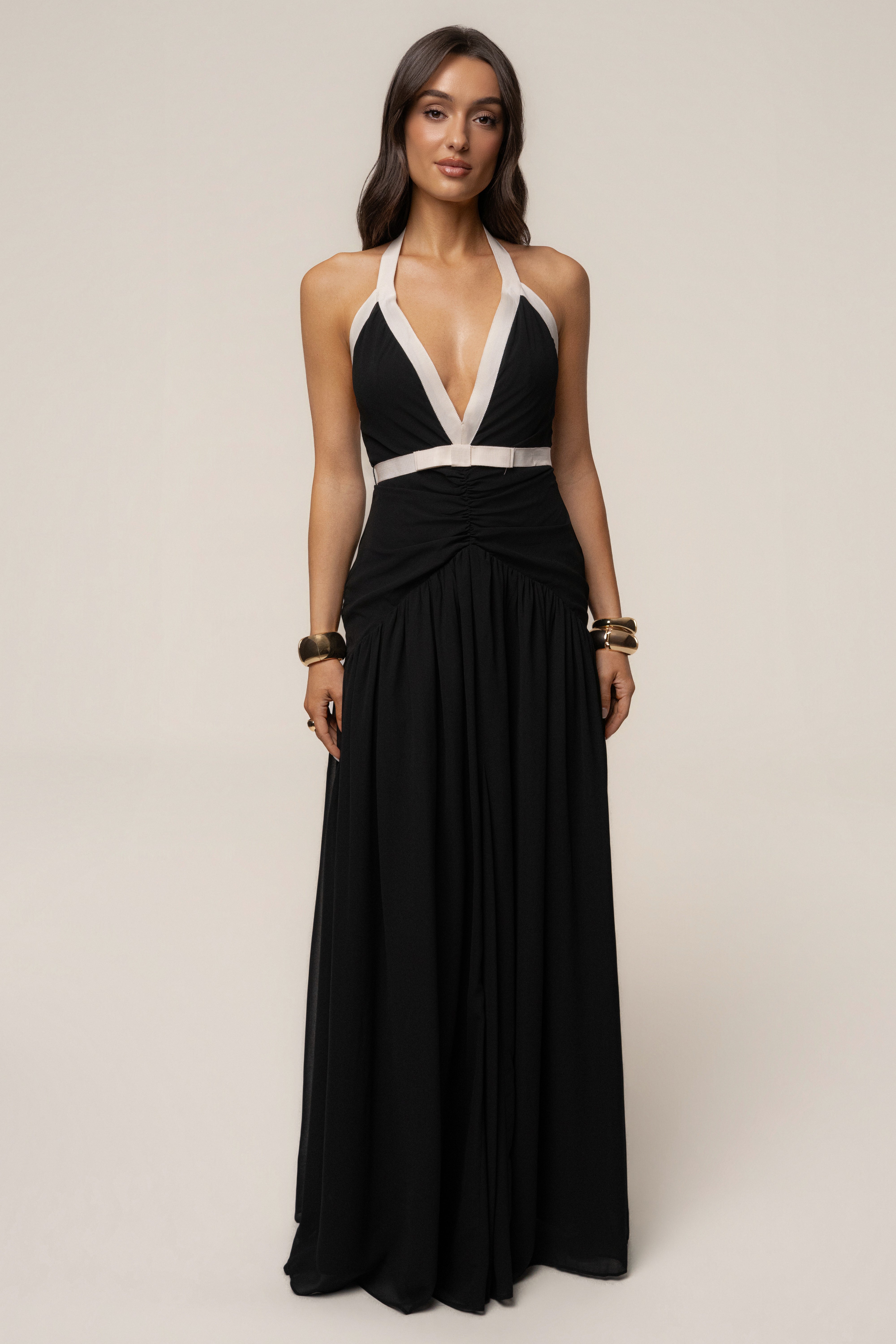 Black and white tourist contrast maxi dress by JLUXLABEL, flowing fabric and stylish design perfect for casual or special occasions.
