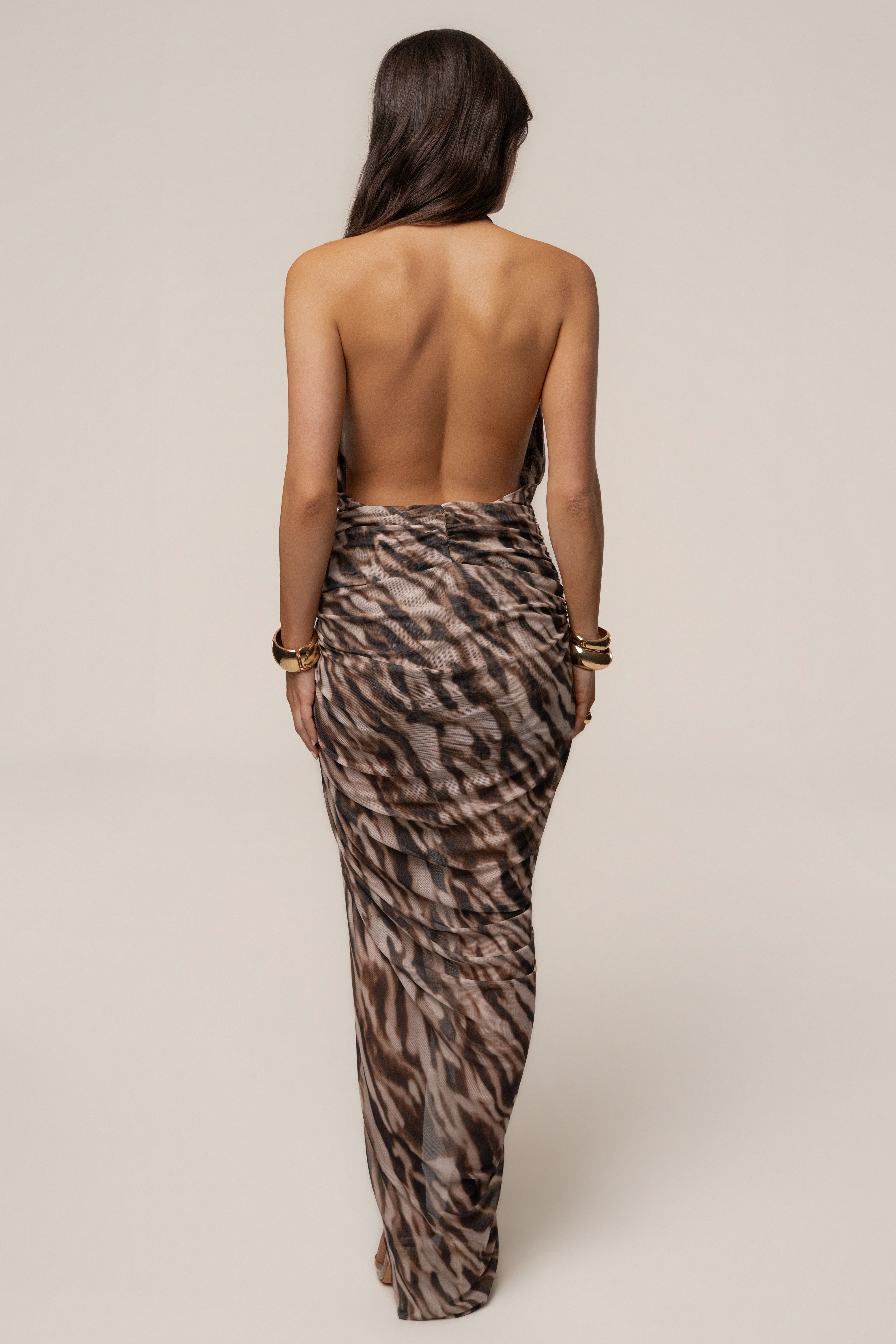 Brown Zebra Ariana Plunge Halter Dress by JLUXLABEL, featuring a plunging neckline and halter style in a bold zebra print.