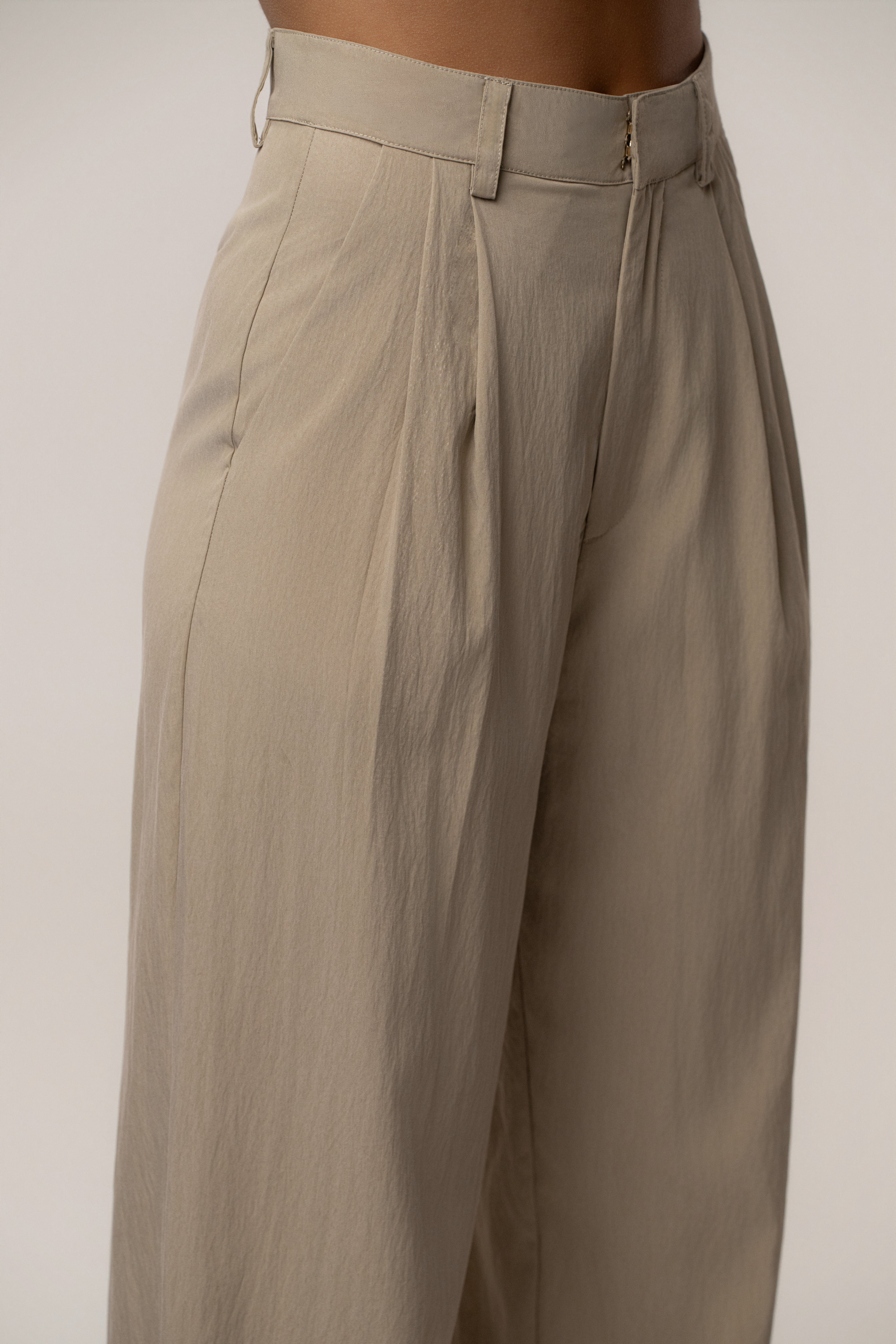 Taupe JLUXLABEL Essential Flow Trouser, stylish bottoms with a relaxed fit and tailored design, perfect for casual or office wear.
