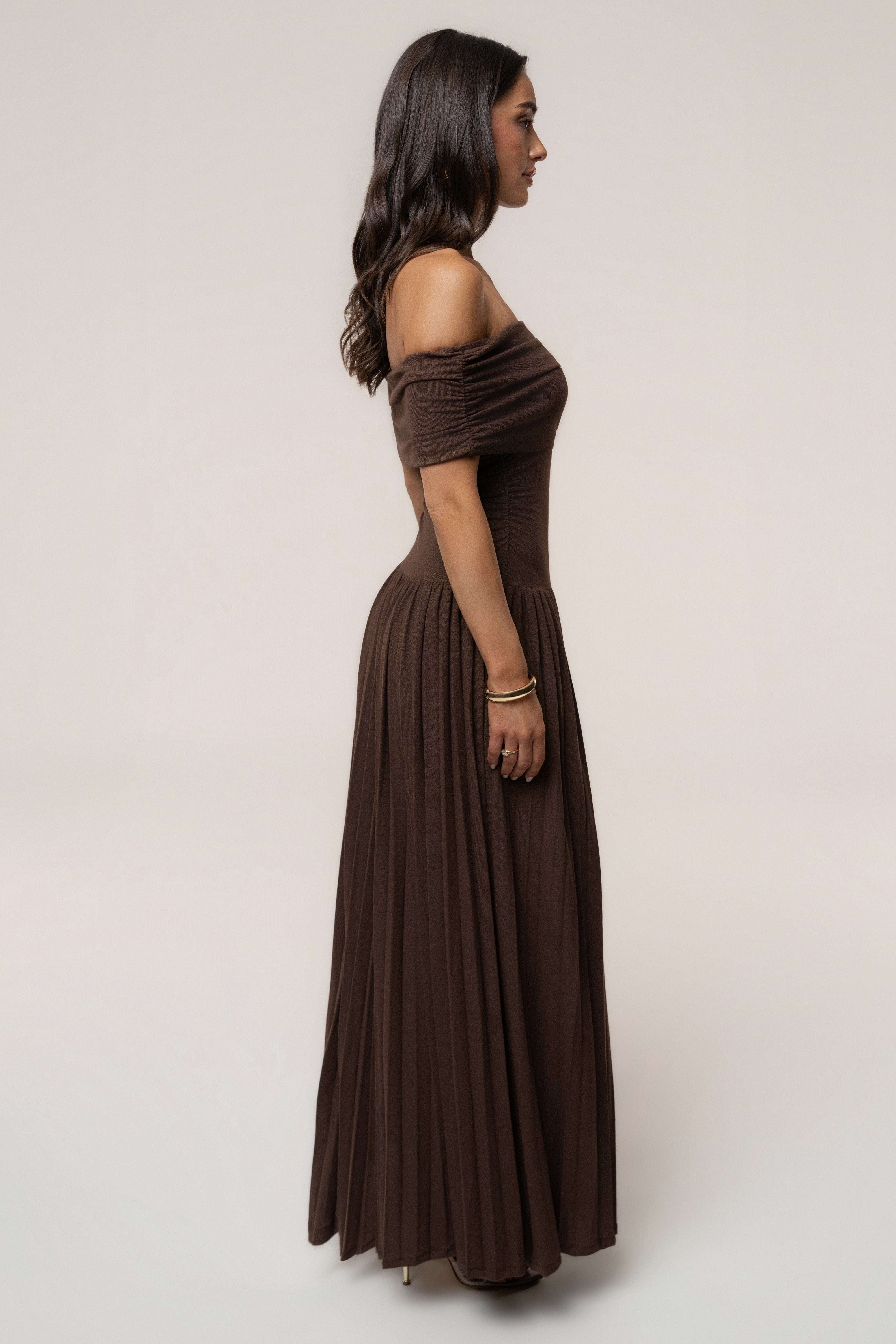 Brown JLUXLABEL infinite pleated maxi dress with flowing fabric and elegant design, perfect for stylish occasions.