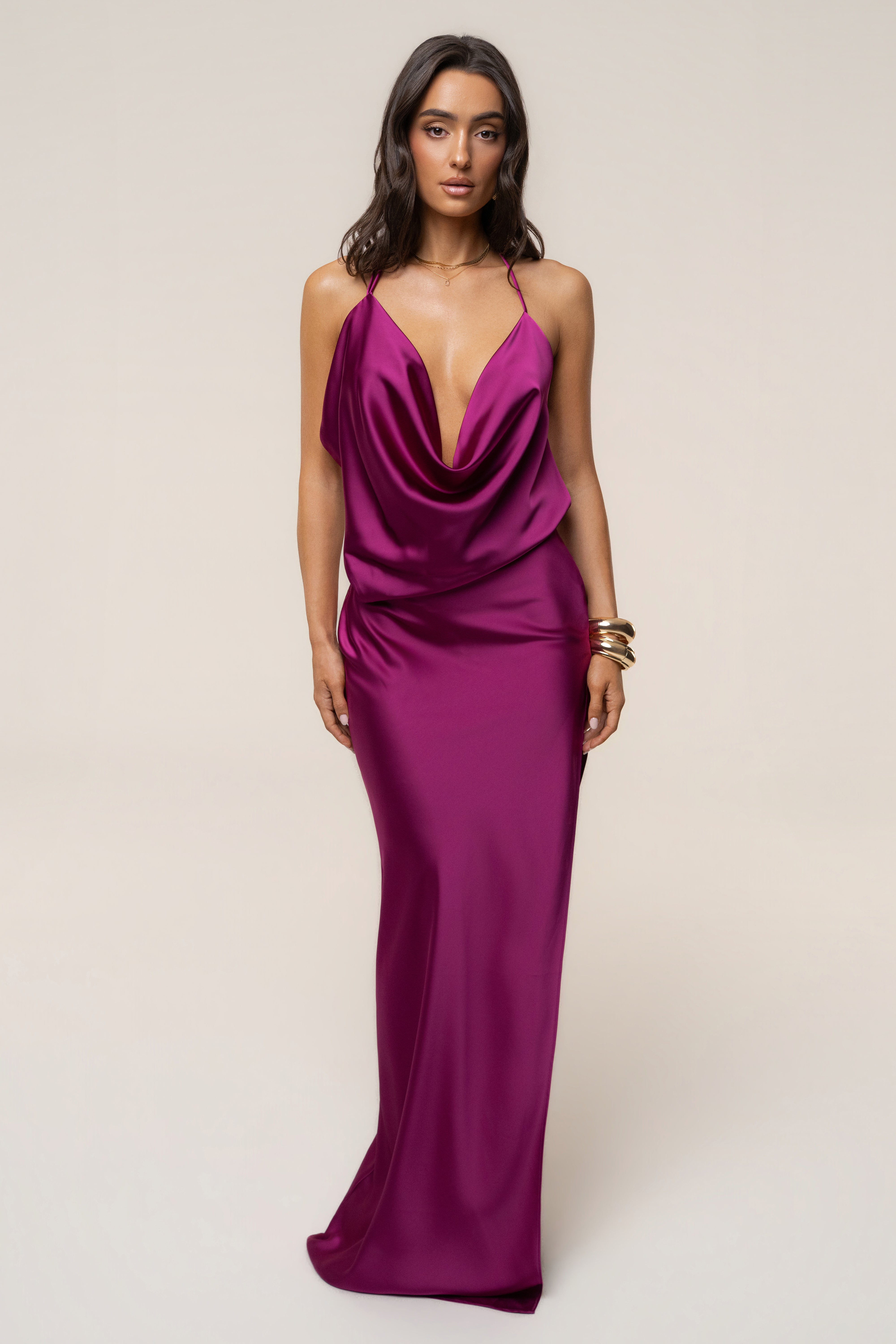 Front view of a model in a fuchsia Delmara Cowl Maxi Dress featuring a draped plunging neckline