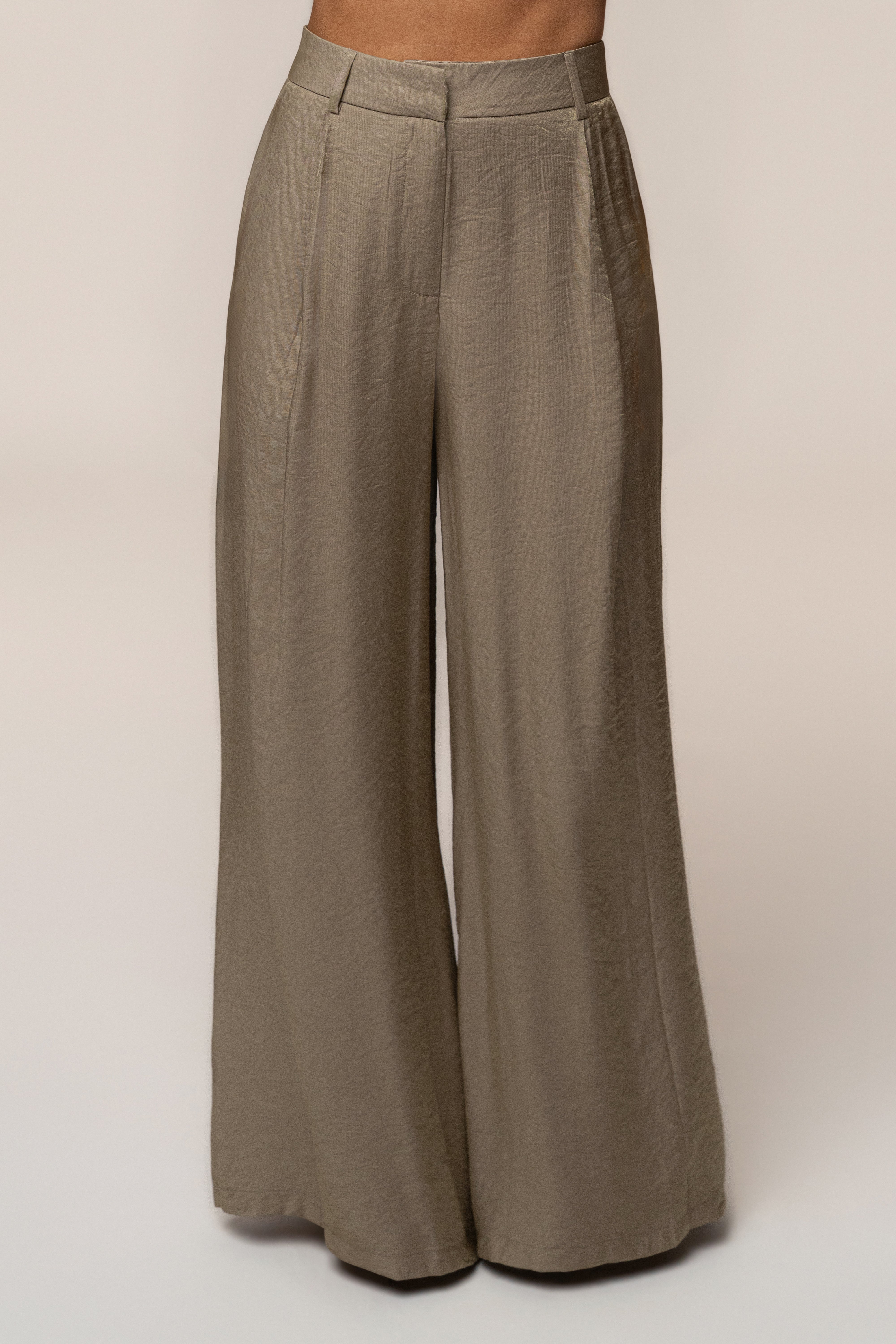 Waist view of olive Monaco wide leg pant with belt loops and front pleats.