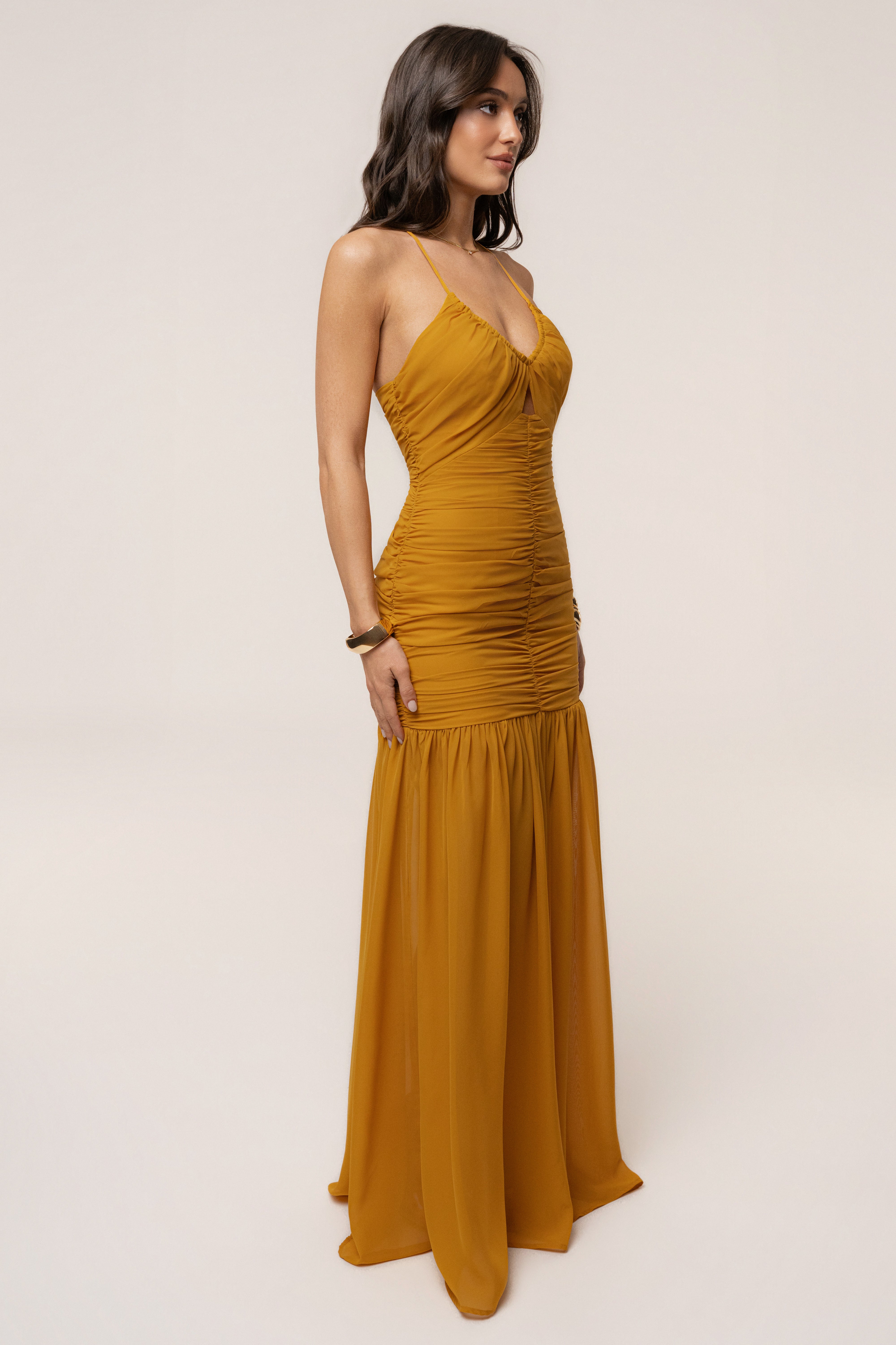 Mustard Vienna chiffon maxi dress by JLUXLABEL featuring a flowy silhouette and elegant design, displayed on a hanger.