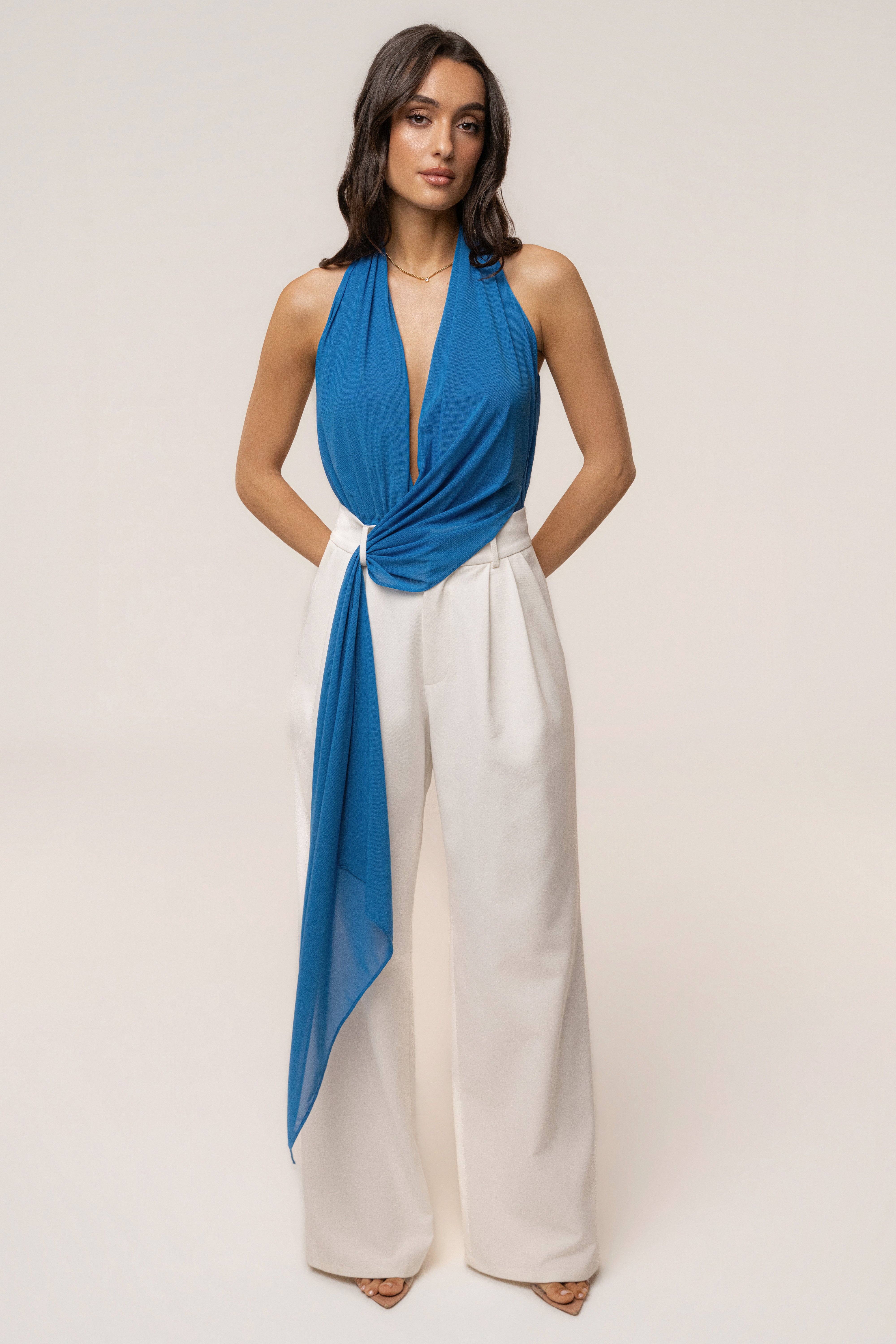 Blue JLUXLABEL Bare Form plunge bodysuit, form-fitting top with deep neckline, showcased on a mannequin.