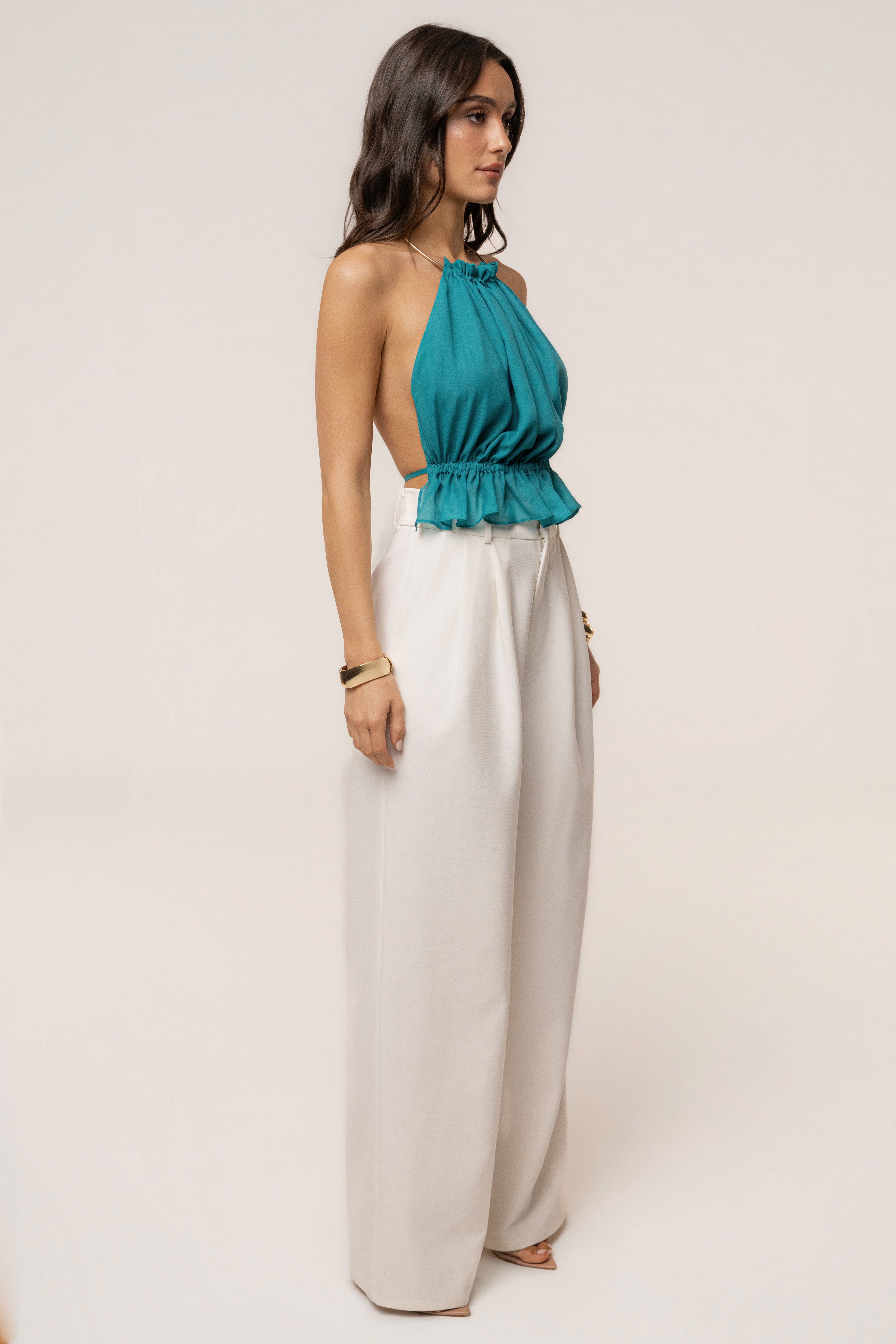 Aqua Moonlit Coast halter top from JLUXLABEL featuring a vibrant blue color and stylish neckline, displayed on a mannequin.