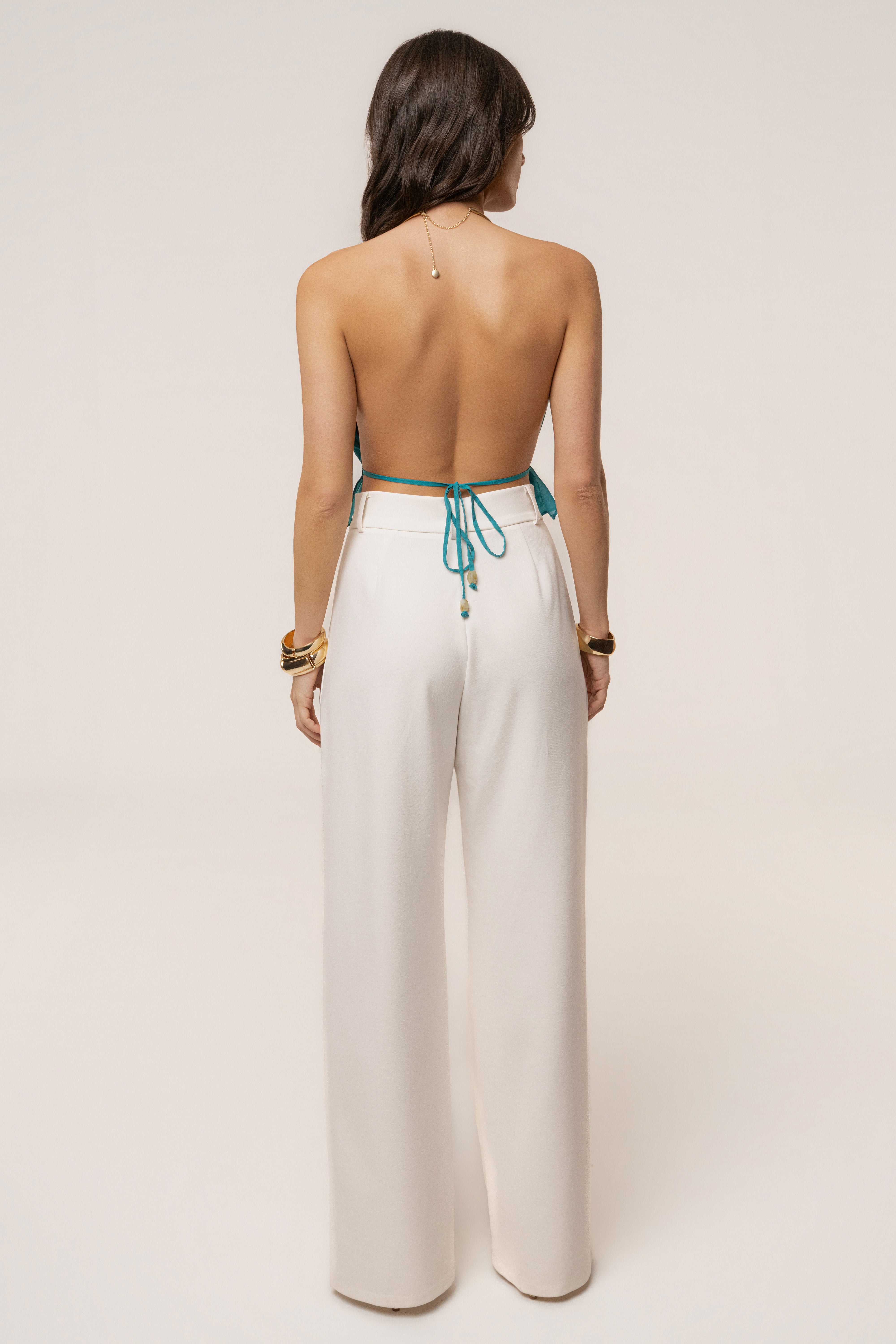 Aqua Moonlit Coast halter top by JLUXLABEL featuring a vibrant blue color and stylish design, displayed on a mannequin.