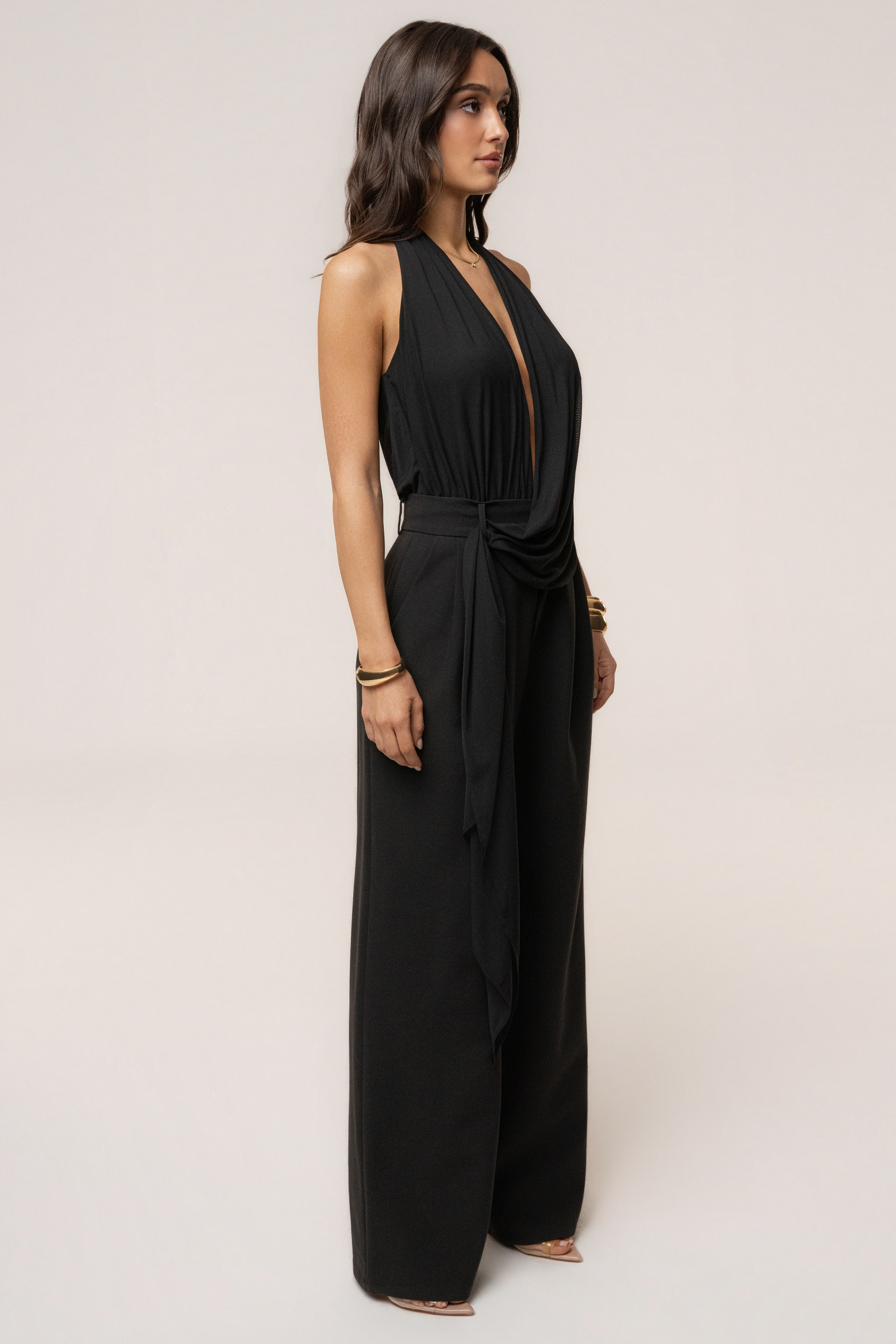 Black JLUXLABEL Bare Form plunge bodysuit, stylish black top with deep neckline, fitted design, and smooth fabric.