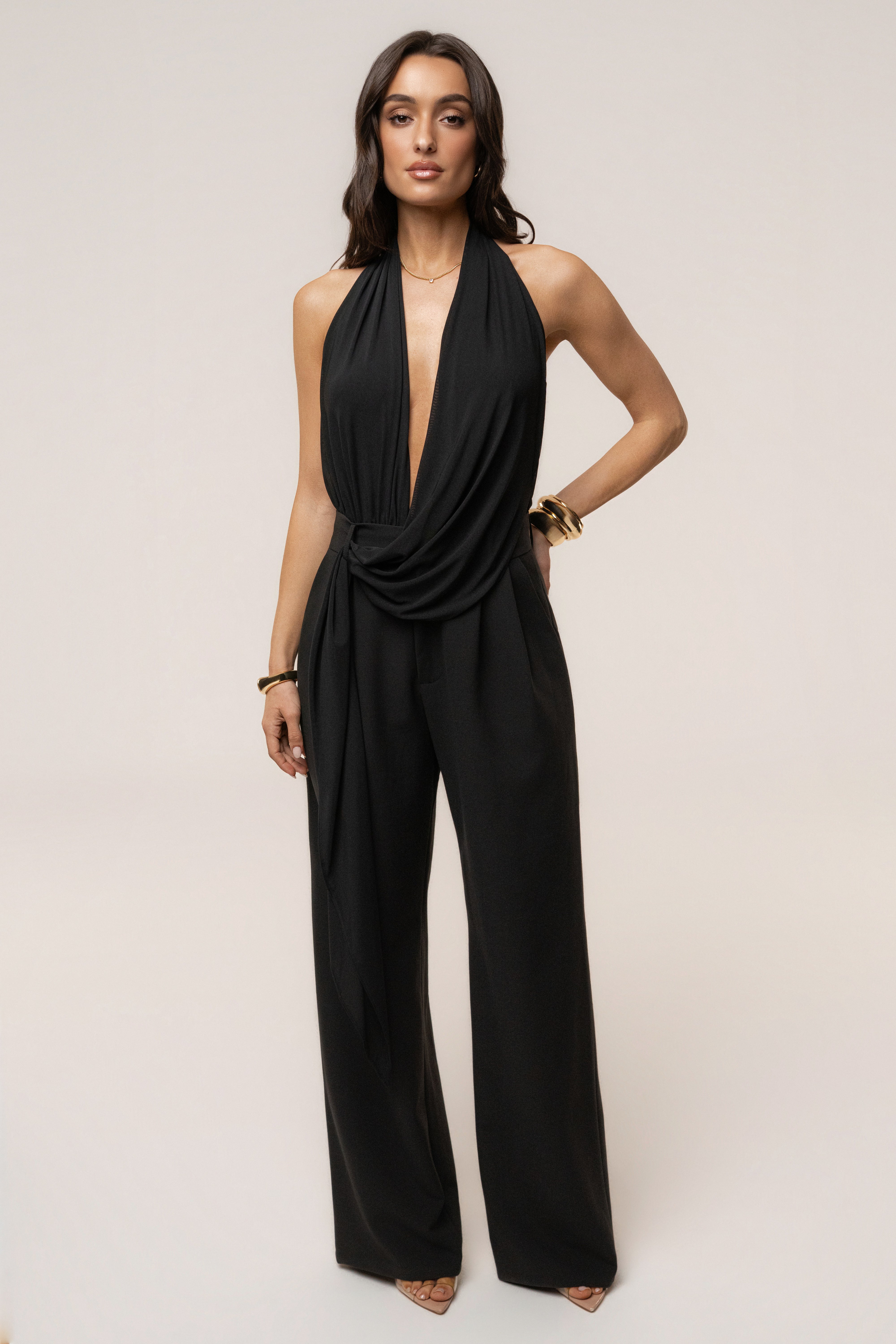 Black JLUXLABEL Bare Form plunge bodysuit displayed as a stylish top with deep V-neck and fitted design.