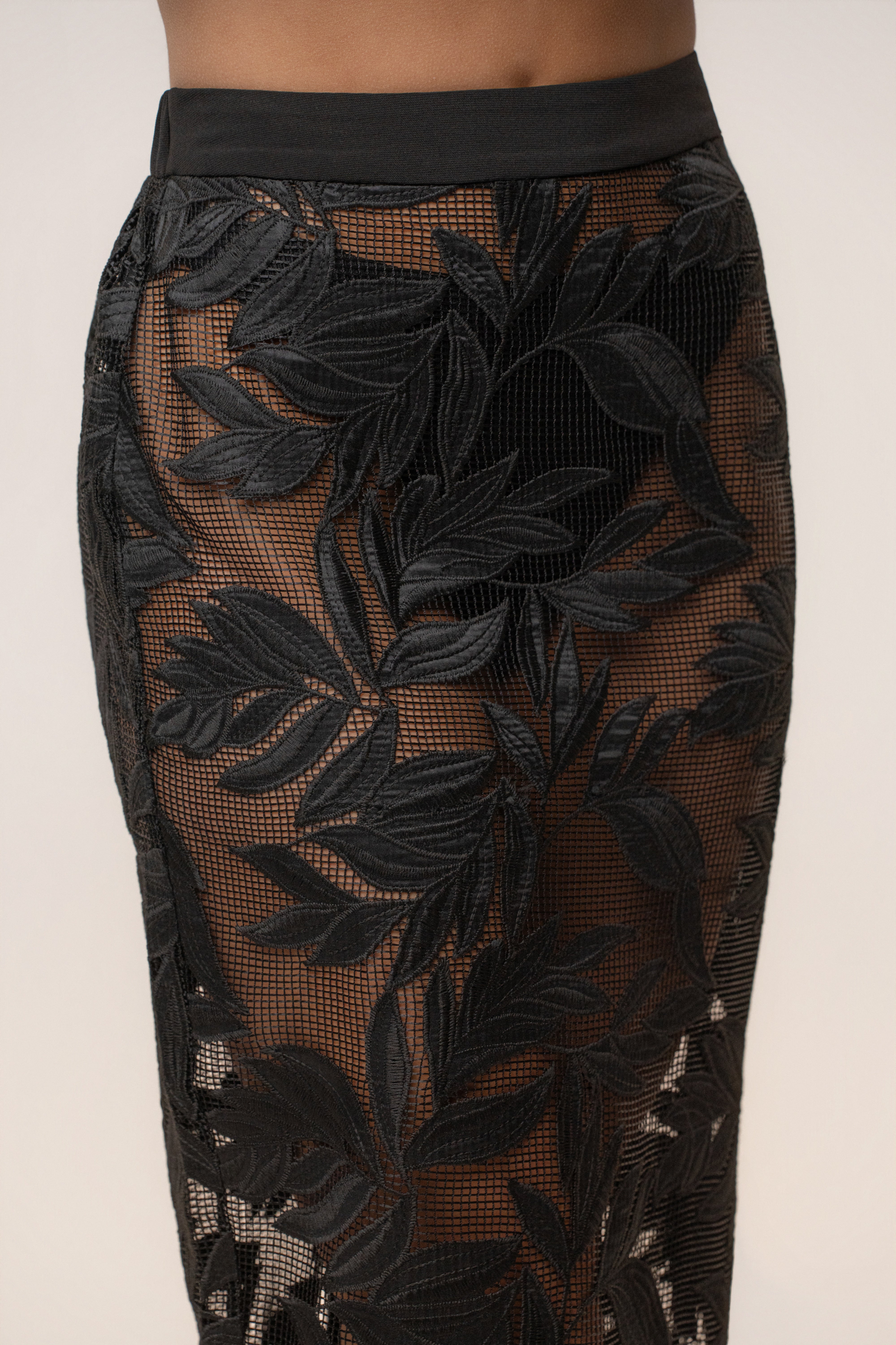 Black Bali Nights embroidered skirt from JLUXLABEL, showcasing intricate embroidery and flowing fabric for elegant summer style.