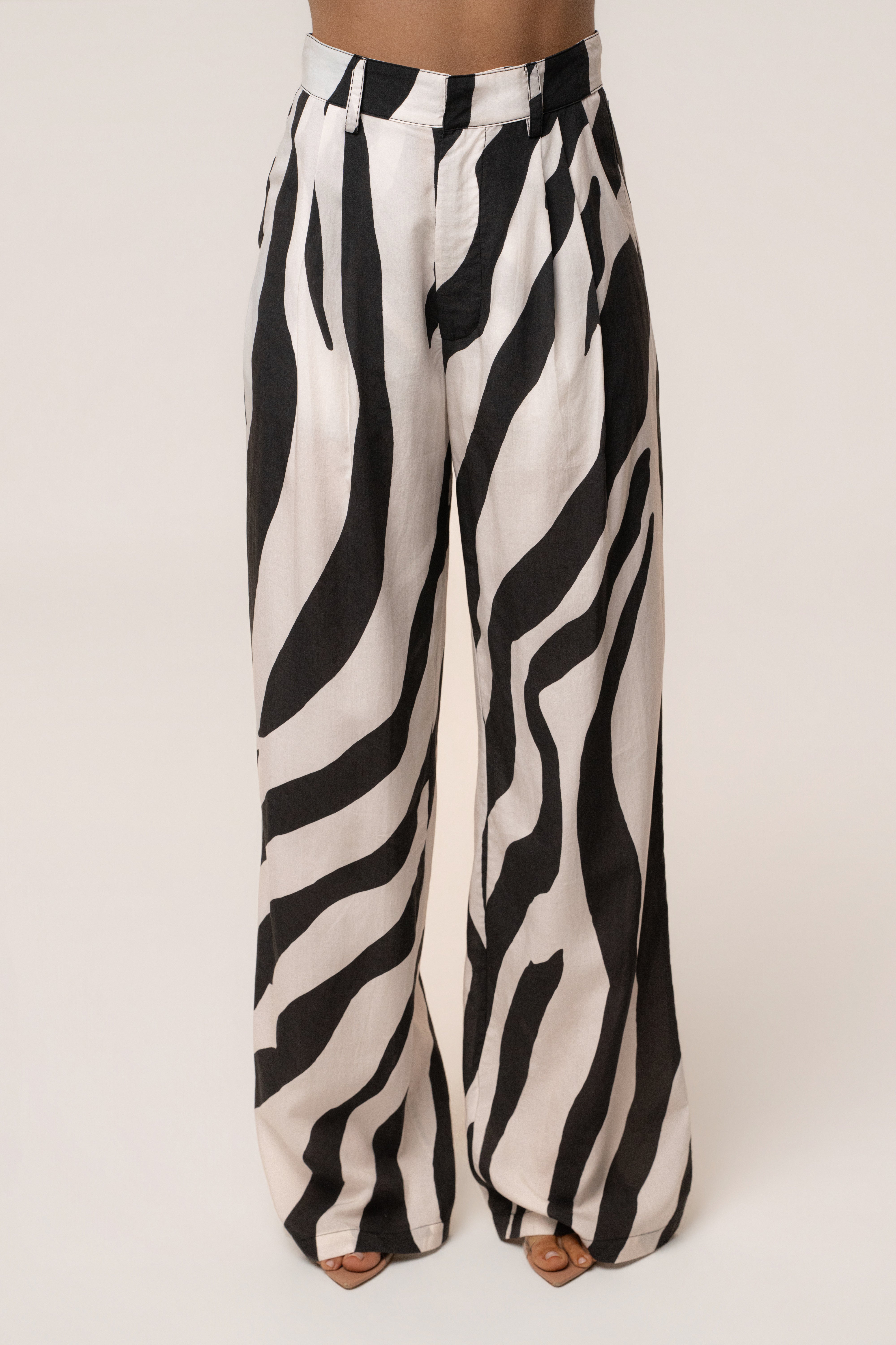 JLUXLABEL Zebra Essential Flow trousers, stylish black bottoms with zebra print, perfect for casual or chic outfits.