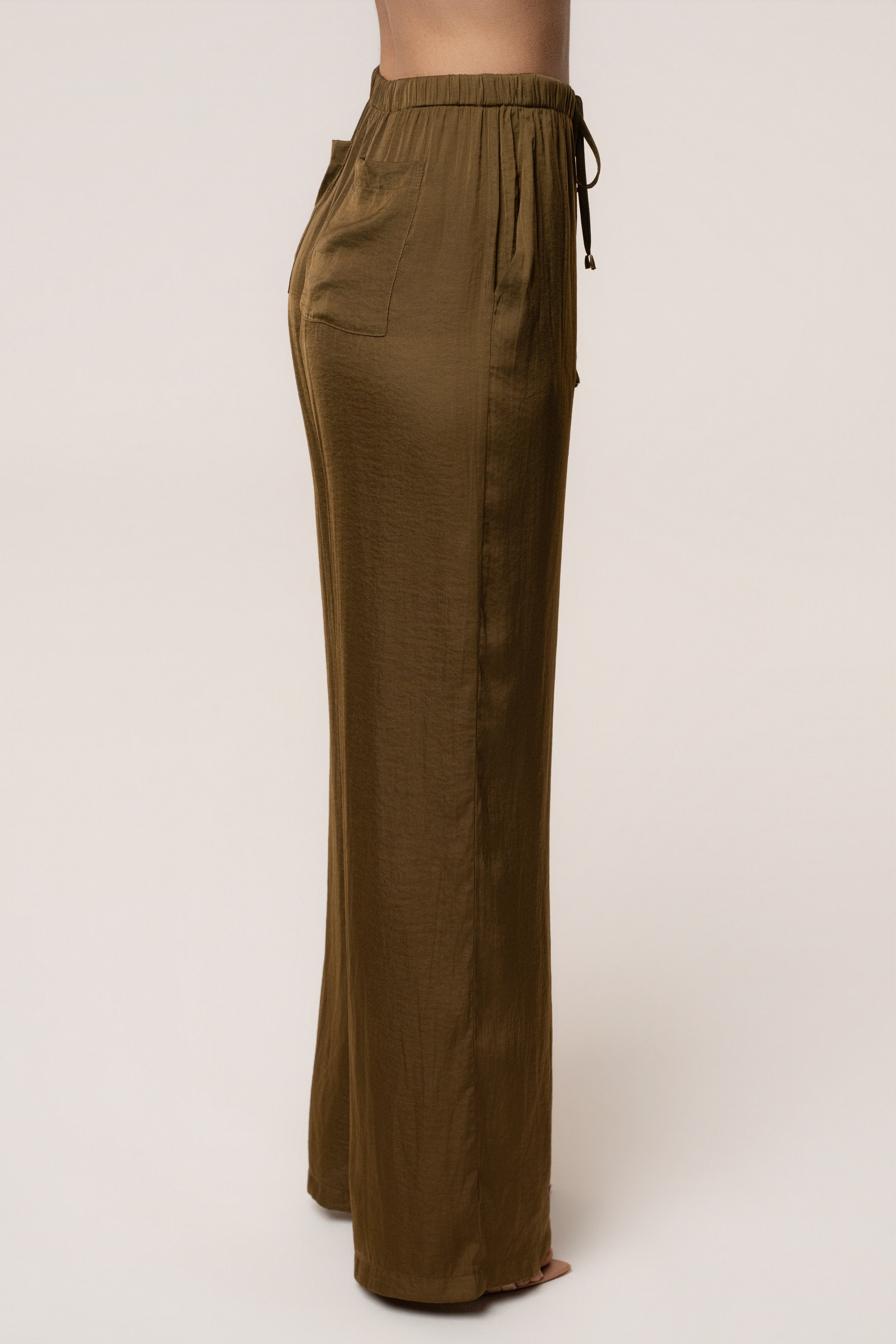 Olive Seaside Glow Pants by JLUXLABEL, stylish bottoms featuring a relaxed fit and comfortable fabric, perfect for casual wear.