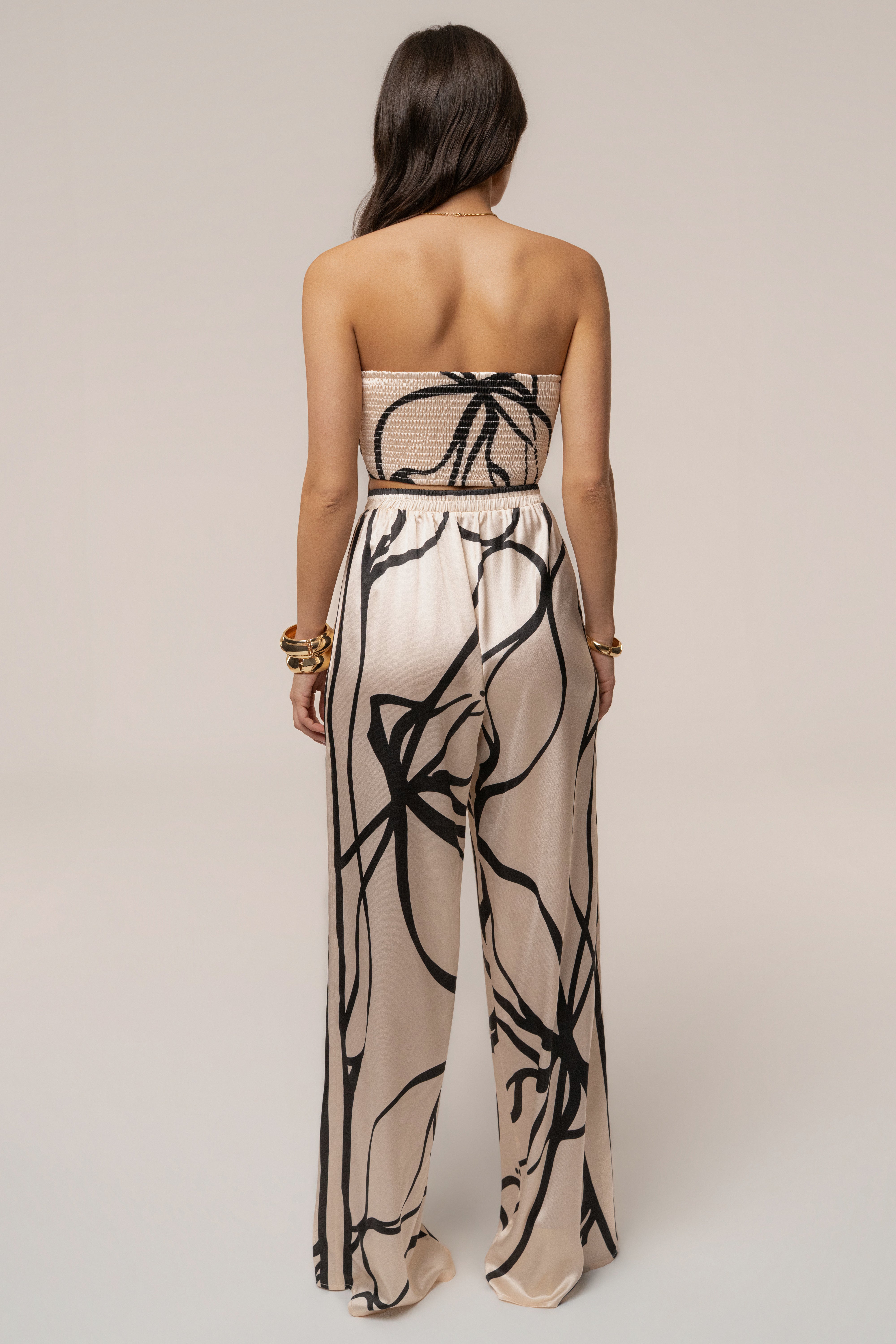 Cream and black art form pant set by JLUXLABEL featuring stylish, comfortable matching top and pants ensemble.