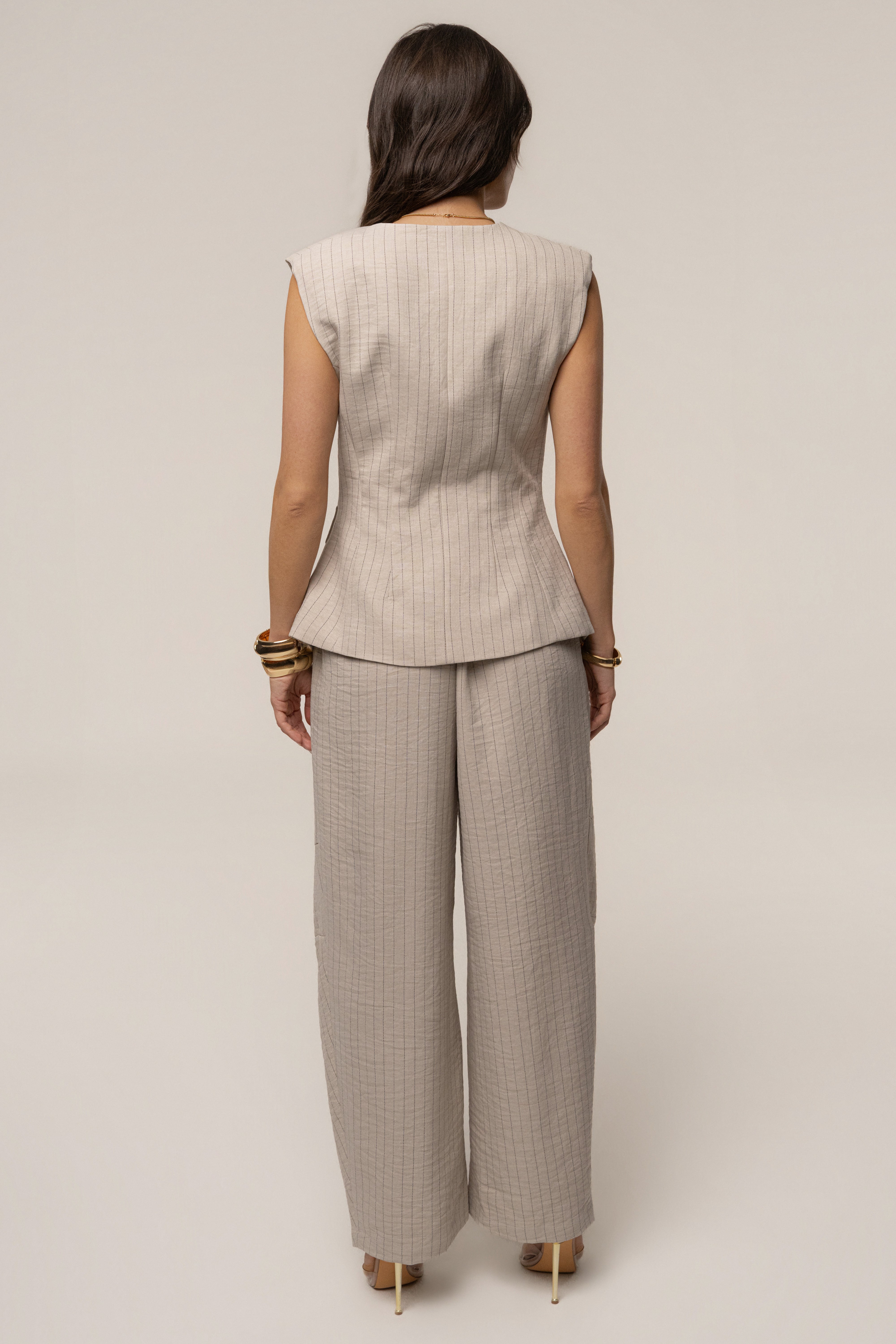 Beige JLUXLABEL power pinstripe pant set featuring tailored high-waisted pants and a matching blazer, stylish and professional.