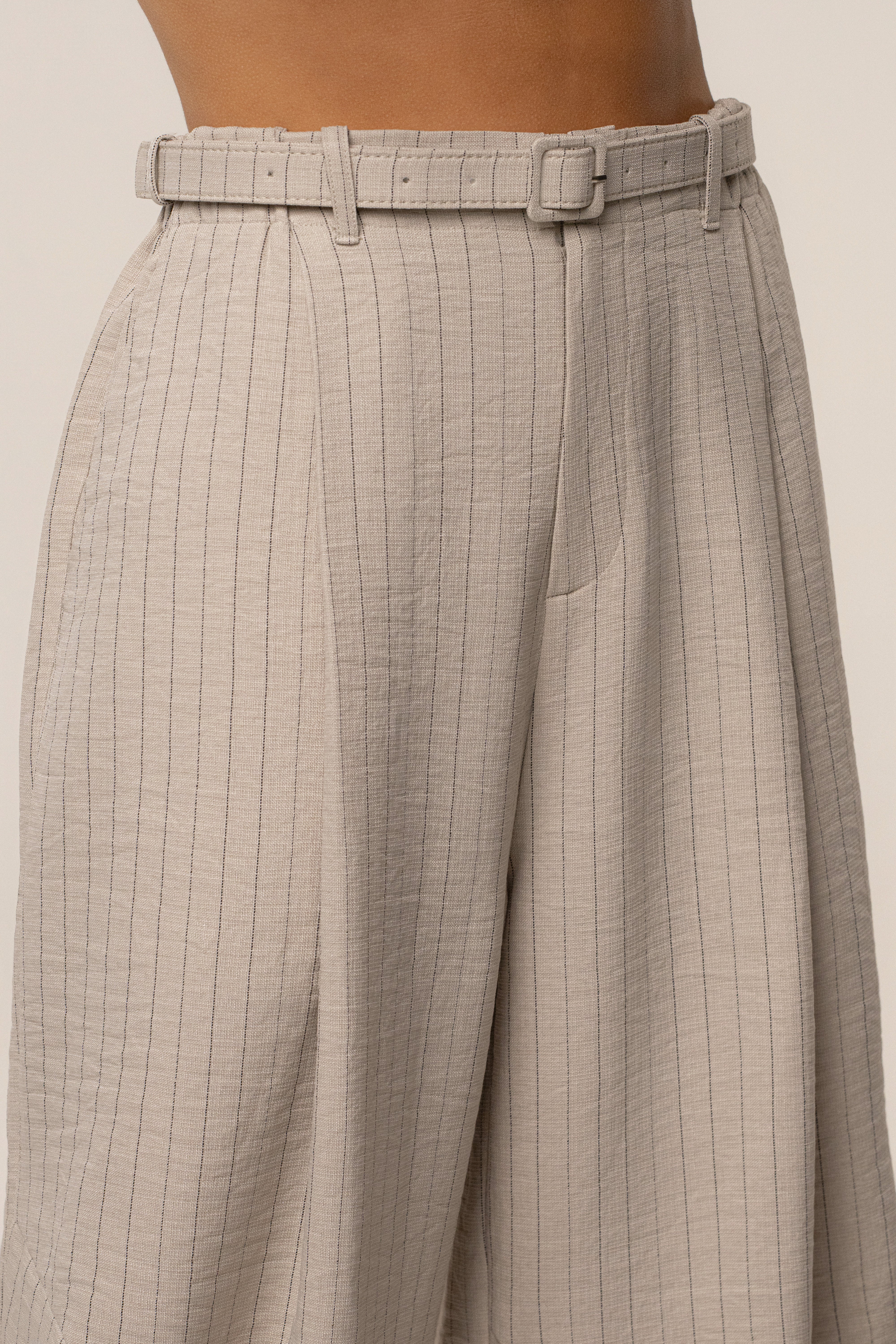 Beige JLUXLABEL Power Pinstripe Pant Set featuring tailored high-waisted trousers and a matching blazer for a professional look.