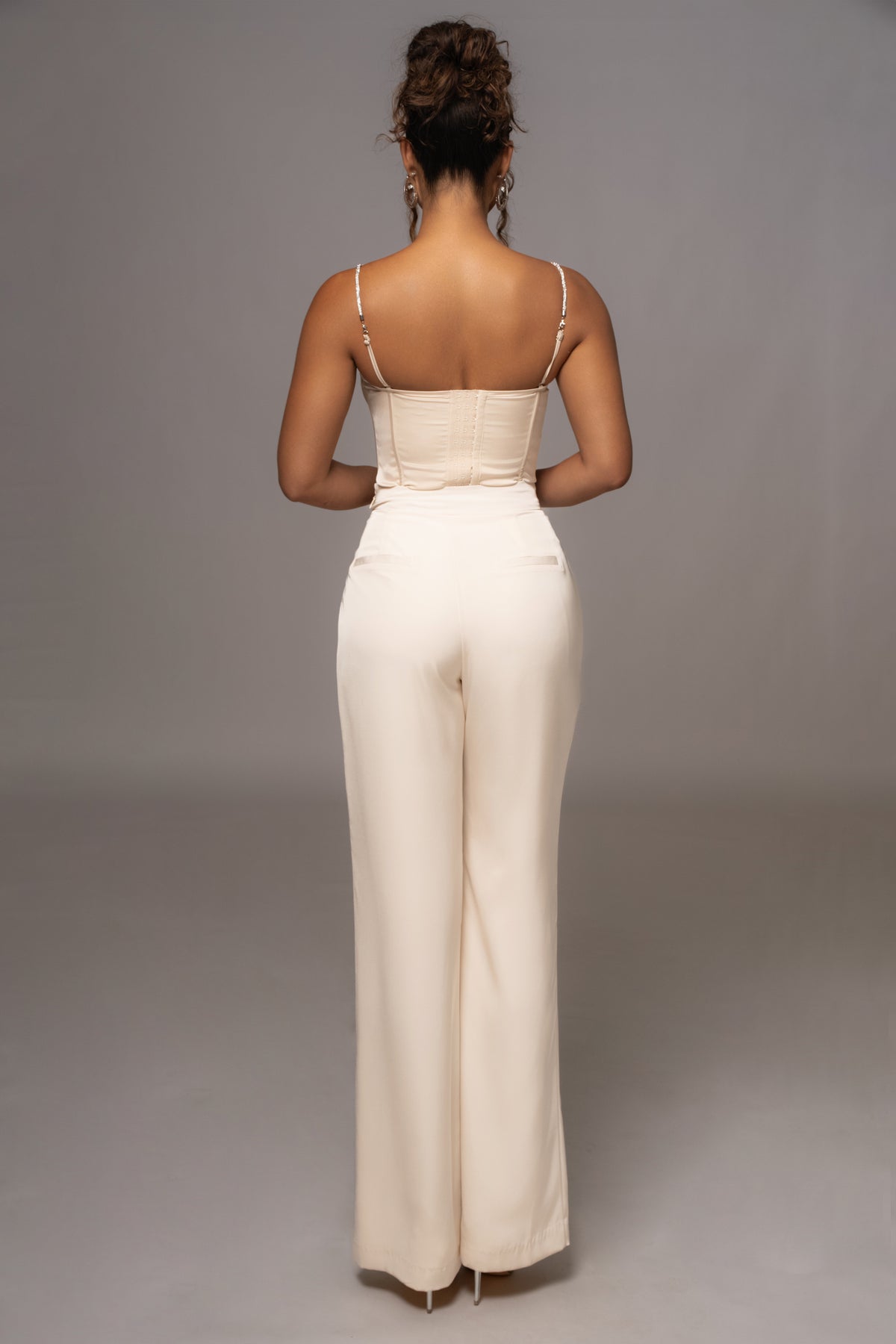 JLUXLABEL Champagne Leo matte satin bustier top with structured design and satin finish, showcasing elegant styling.
