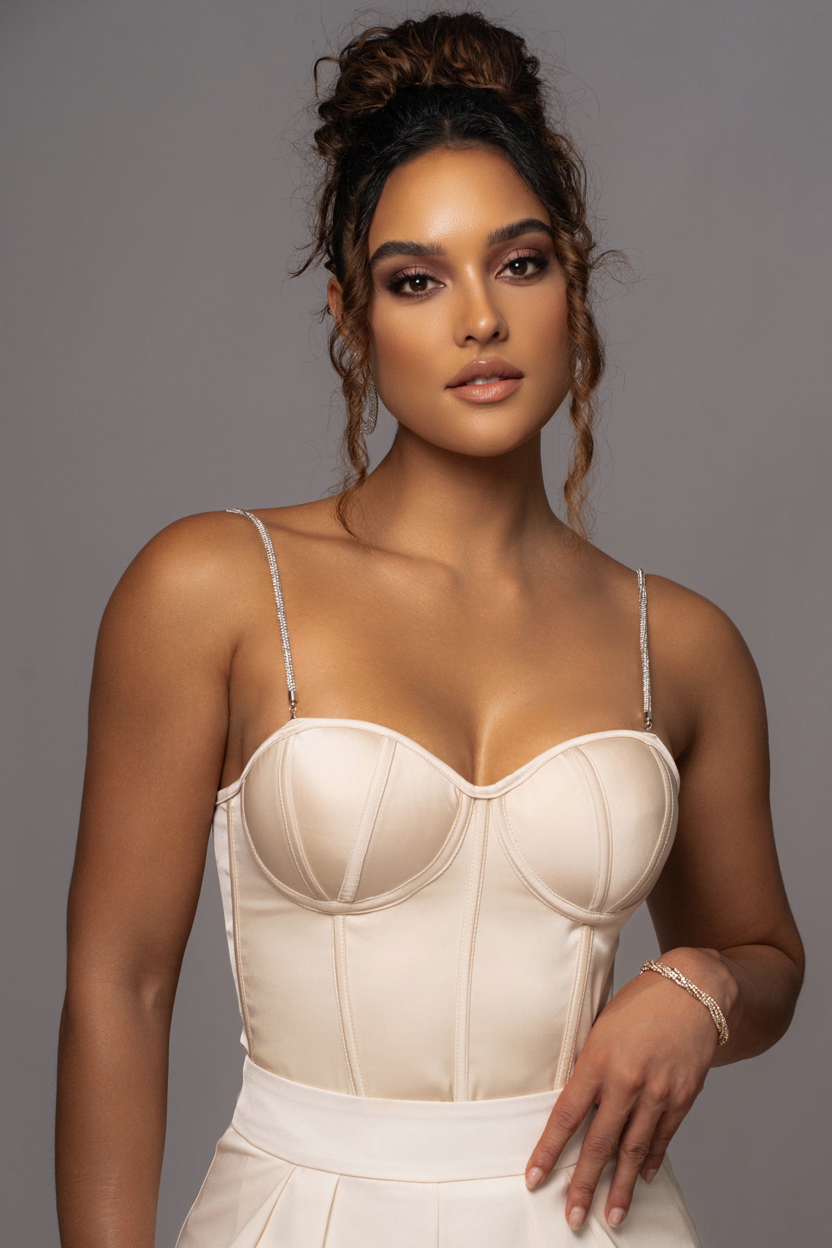 JLUXLABEL Champagne Leo matte satin bustier top with structured design and adjustable straps, featuring a sleek, elegant finish.