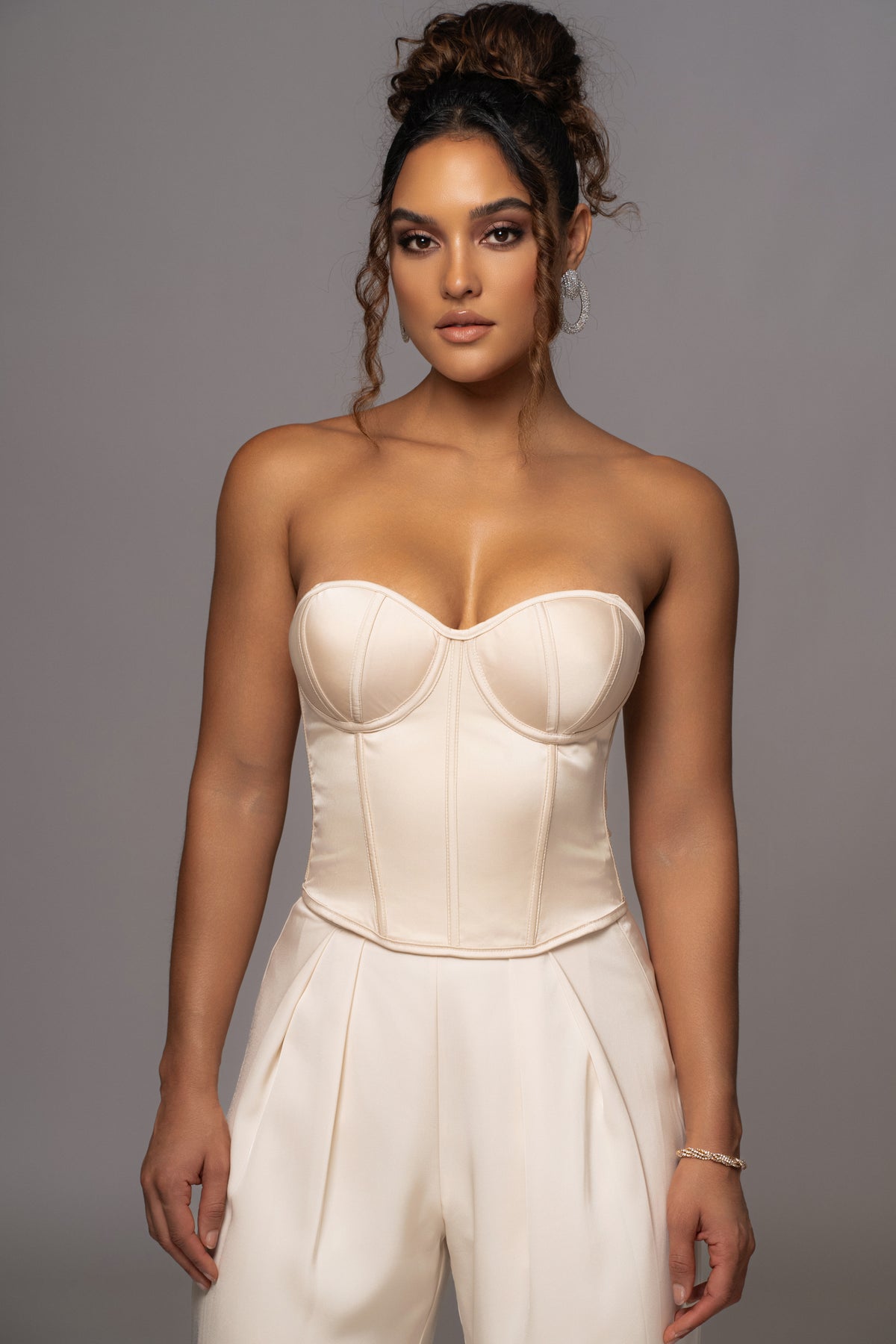 JLUXLABEL Champagne Leo Matte Satin Bustier top with structured design and satin finish, displayed on a plain background.