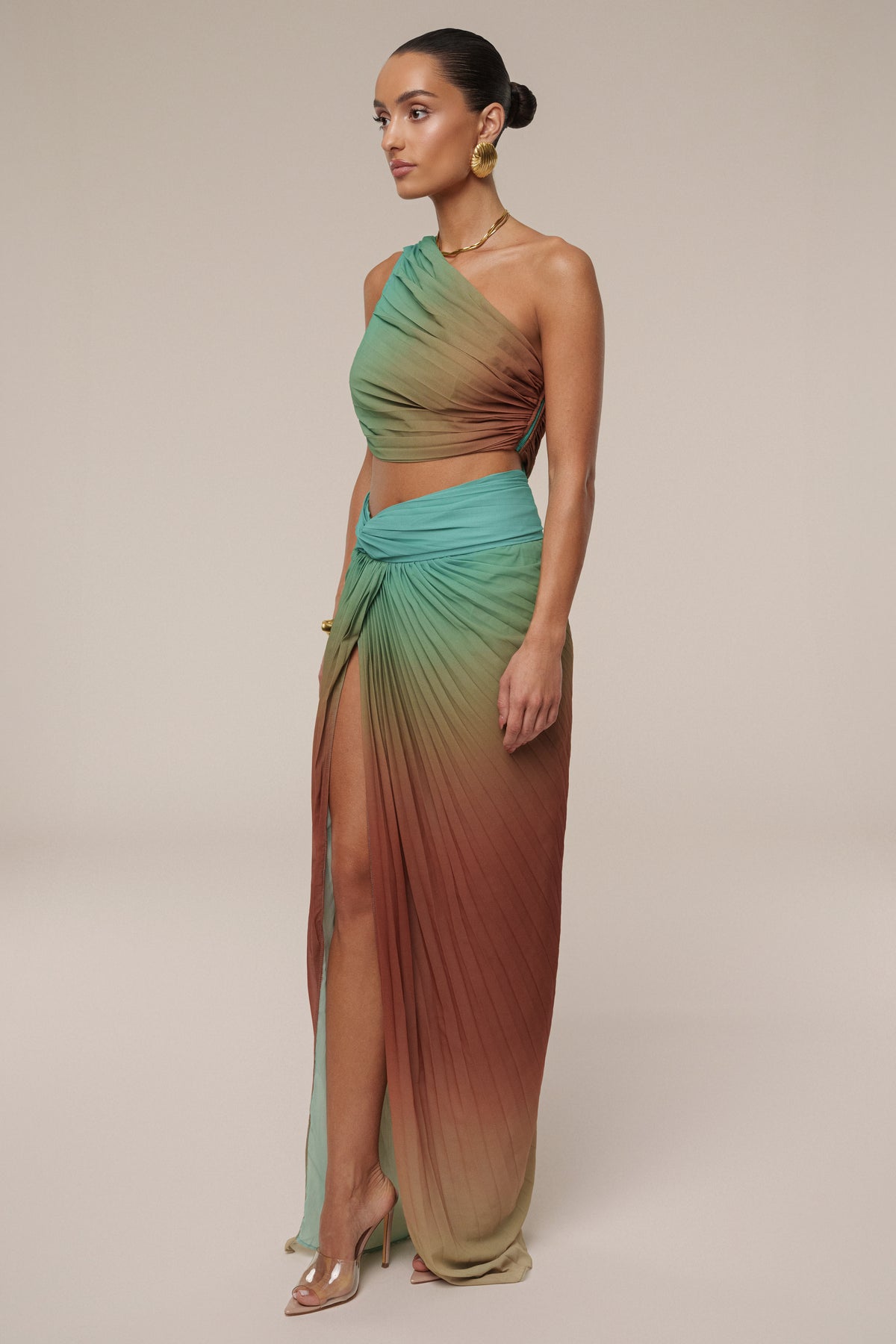 JLUXLABEL Mint Havana Pleat Skirt Set featuring a stylish pleated skirt and matching top on a model.