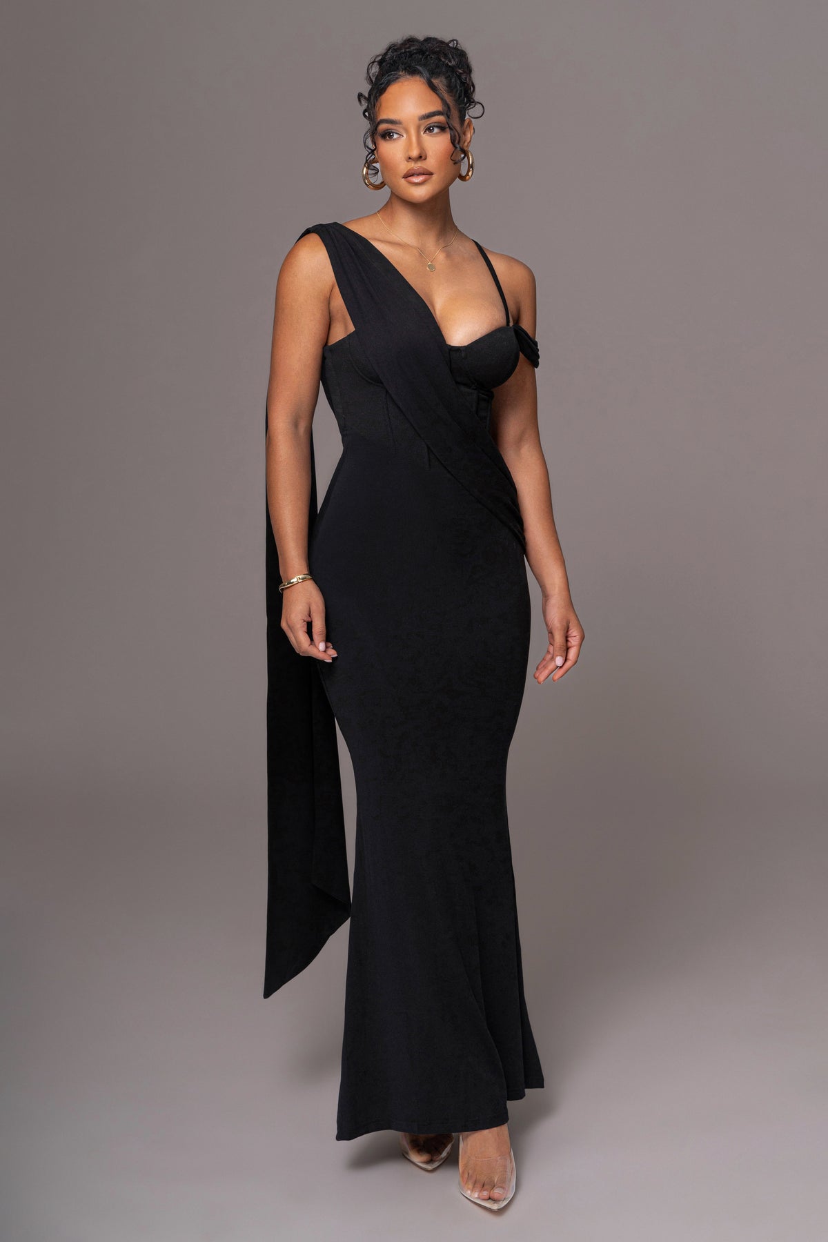 Black Grand Entrance Drape Dress by JLUXLABEL, showcasing elegant fabric and draped design on a stylish dress.