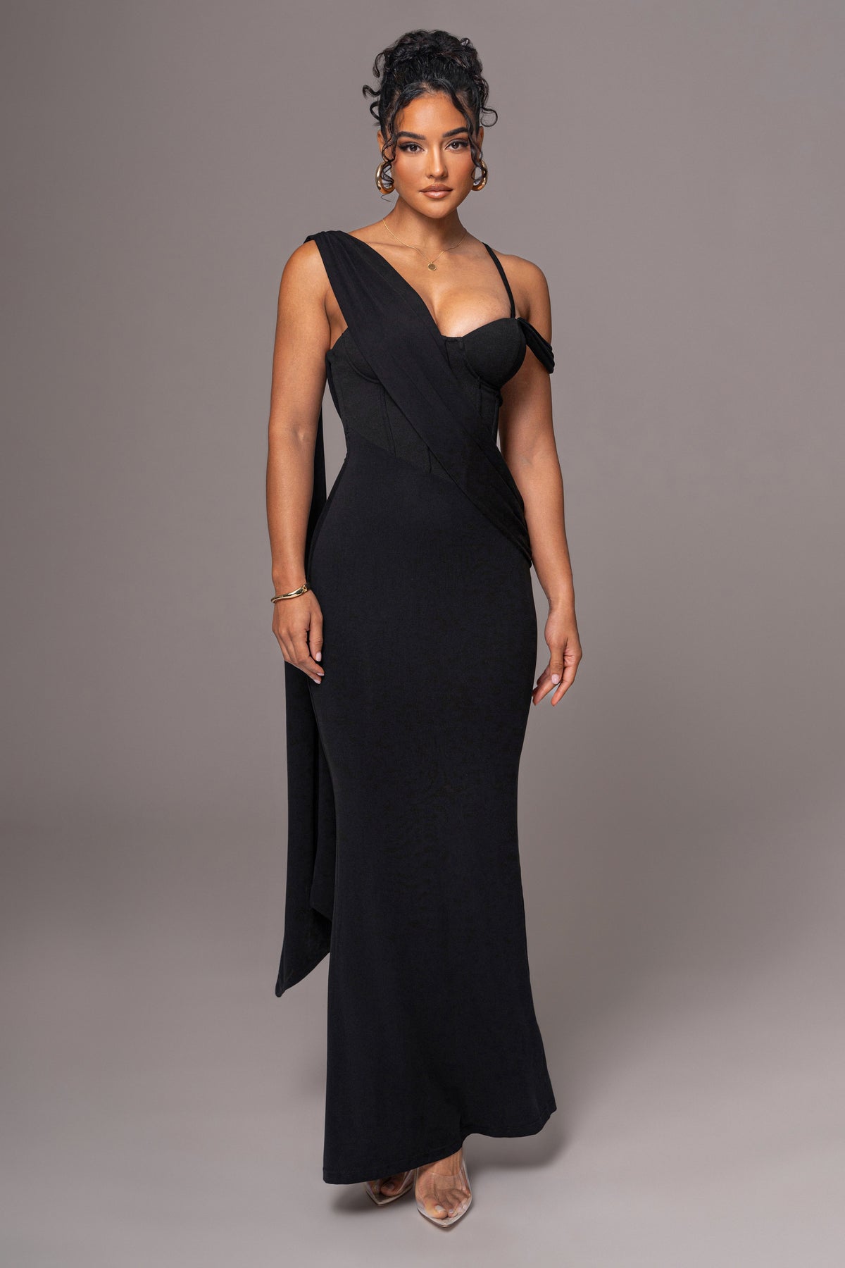 Black Grand Entrance Drape Dress by JLUXLABEL, featuring elegant draped fabric and a sophisticated silhouette.