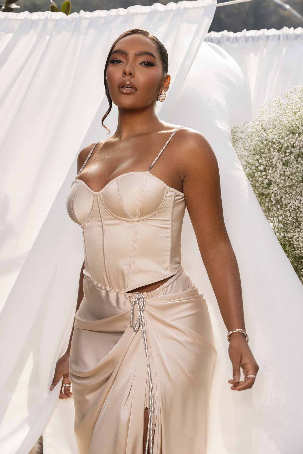 JLUXLABEL Champagne Leo Matte Satin Bustier top featuring a fitted design and satin finish, displayed on a mannequin.