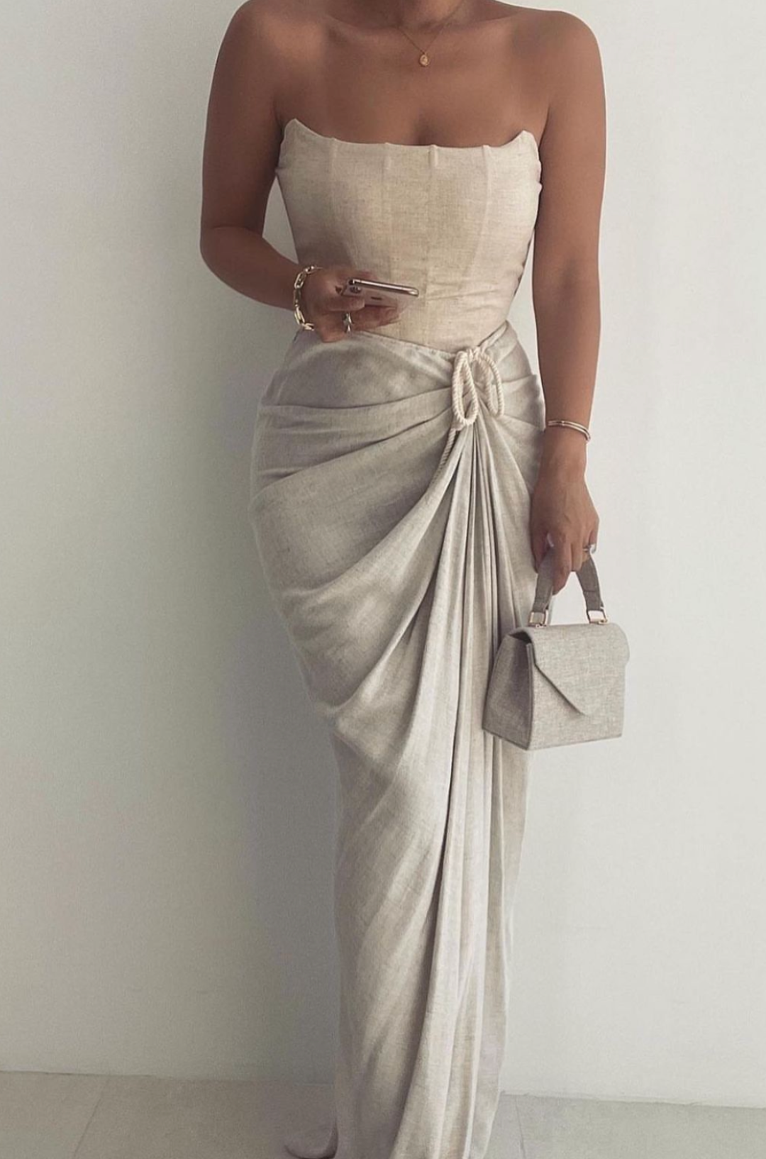 Natural Noelia linen slit skirt by JLUXLABEL, showcasing flowy fabric and stylish slit design in a casual summer look.
