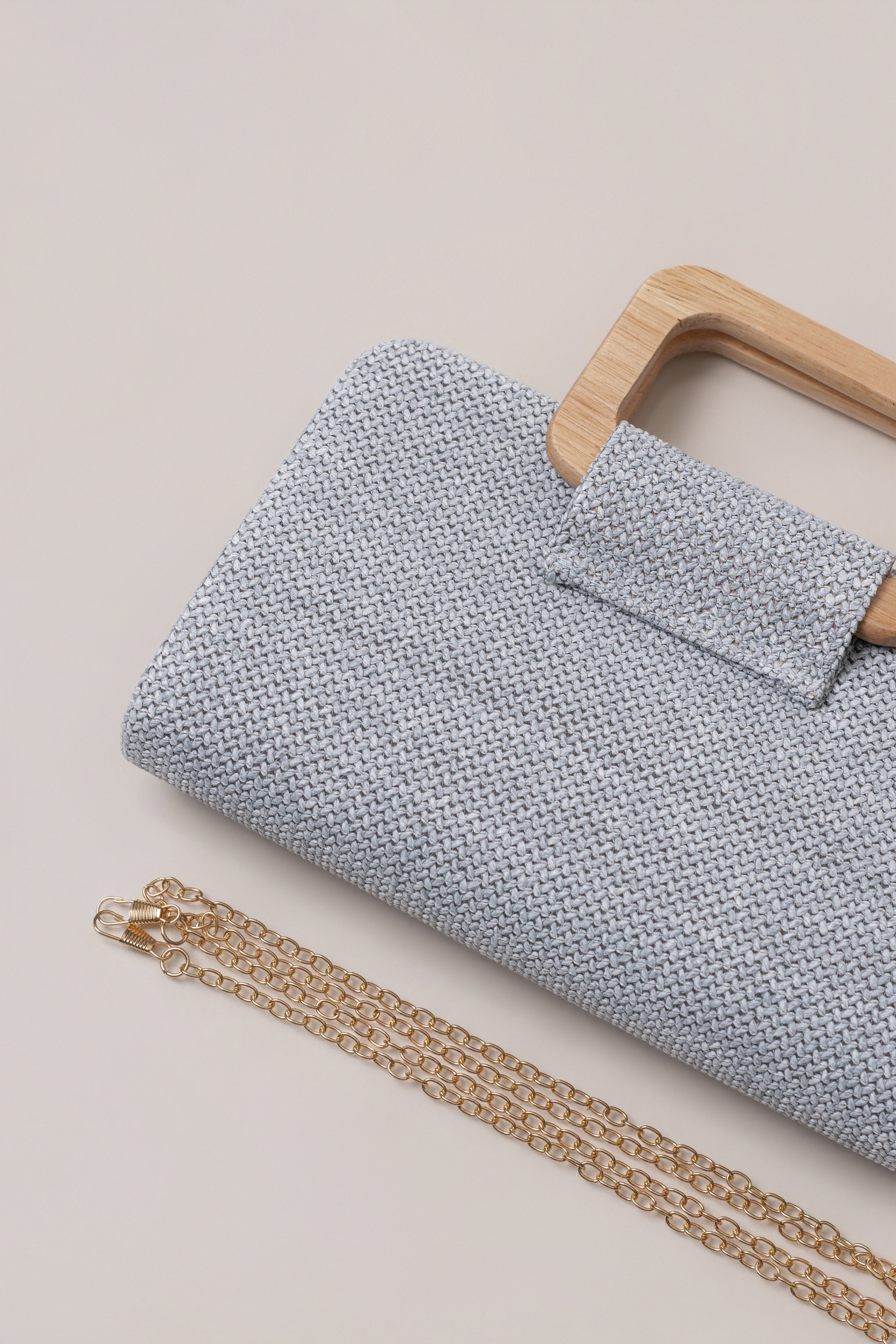 Blue Isola clutch by JLUXLABEL, stylish accessories with a sleek design, perfect for evening or special occasions.