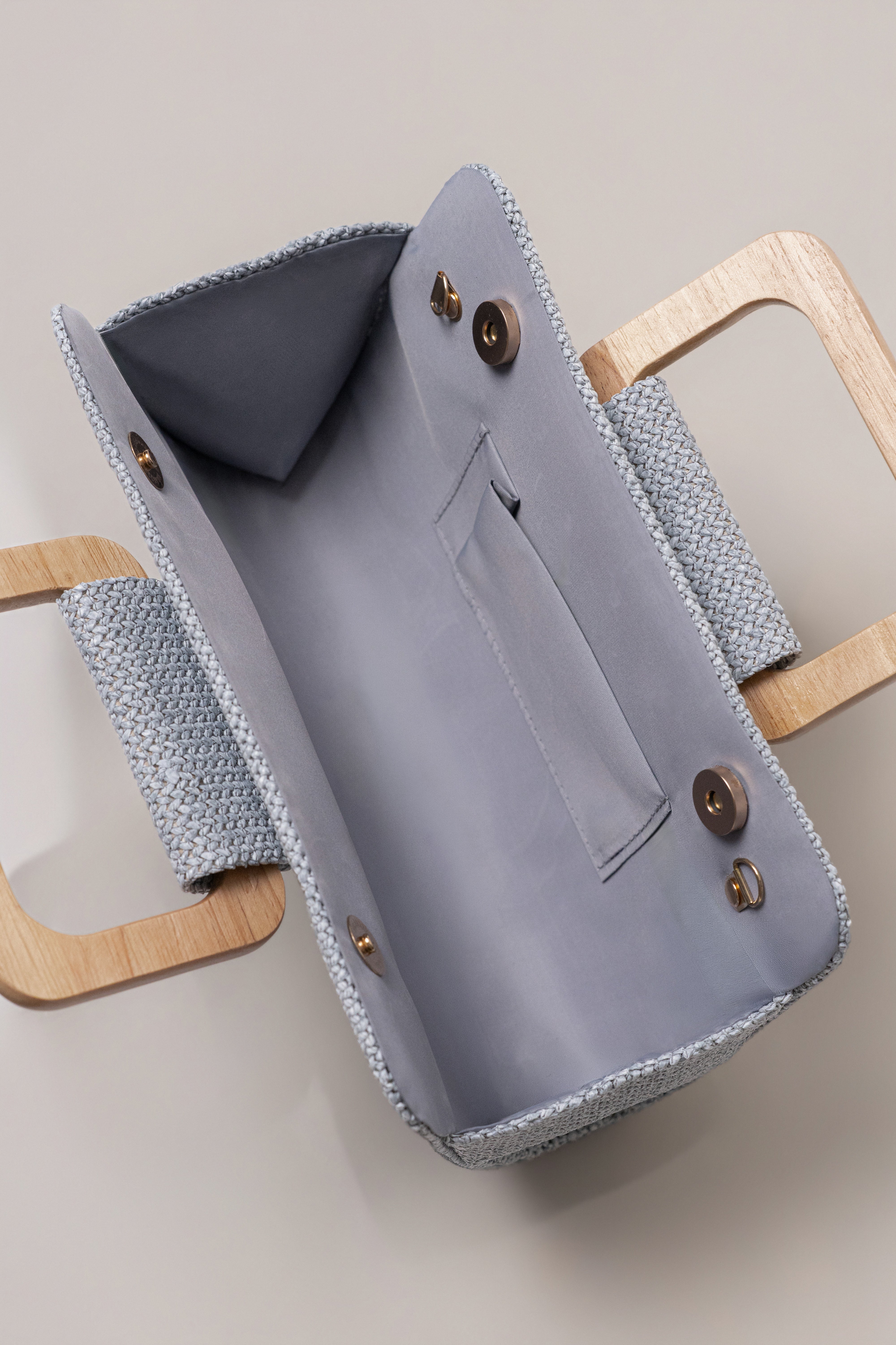 Blue Isola clutch bag by JLUXLABEL, stylish accessories with a sleek design and vibrant color, perfect for evening outings.