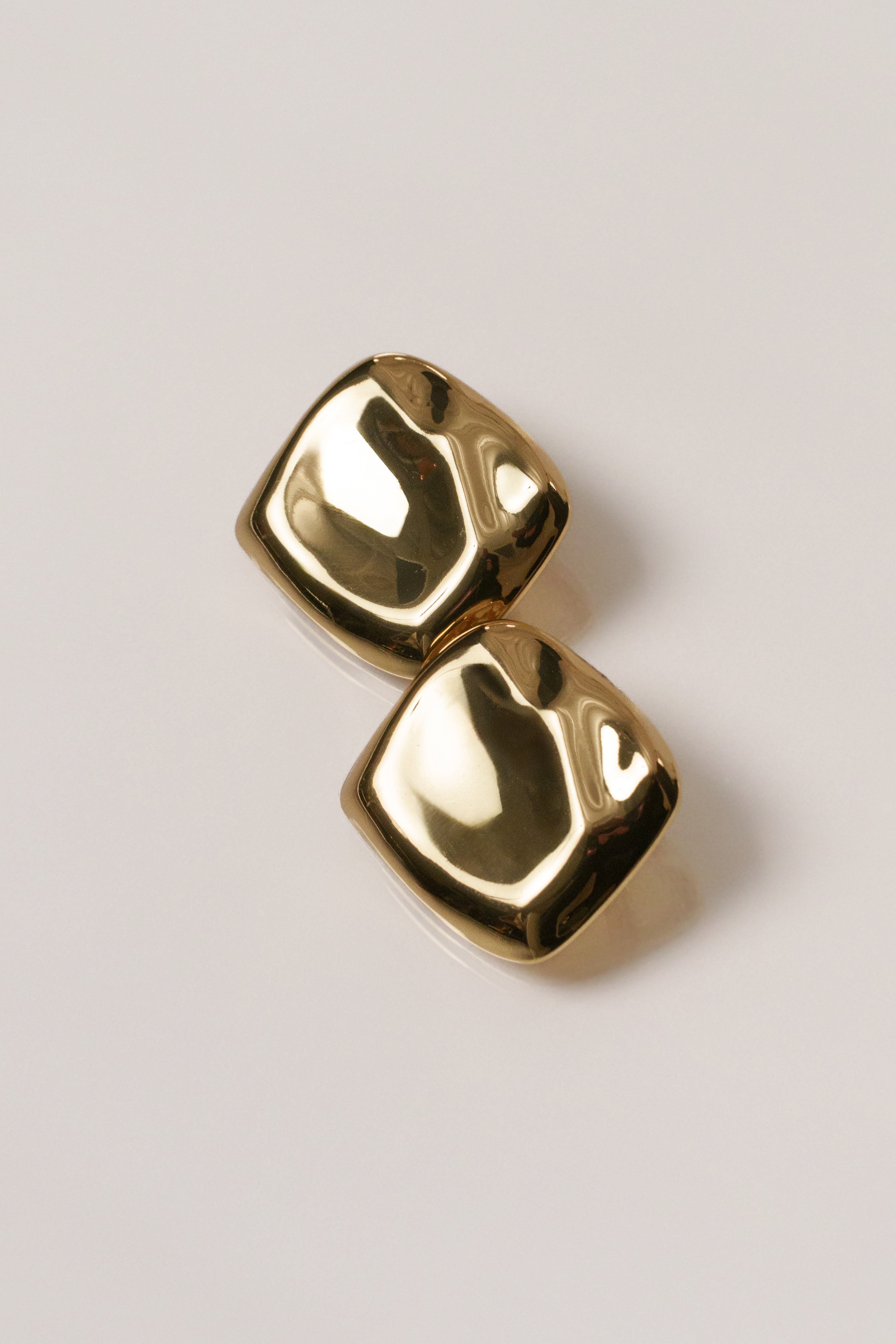 Gold Jane earrings from JLUXLABEL, stylish jewelry with sleek gold finish, shown on a white background.