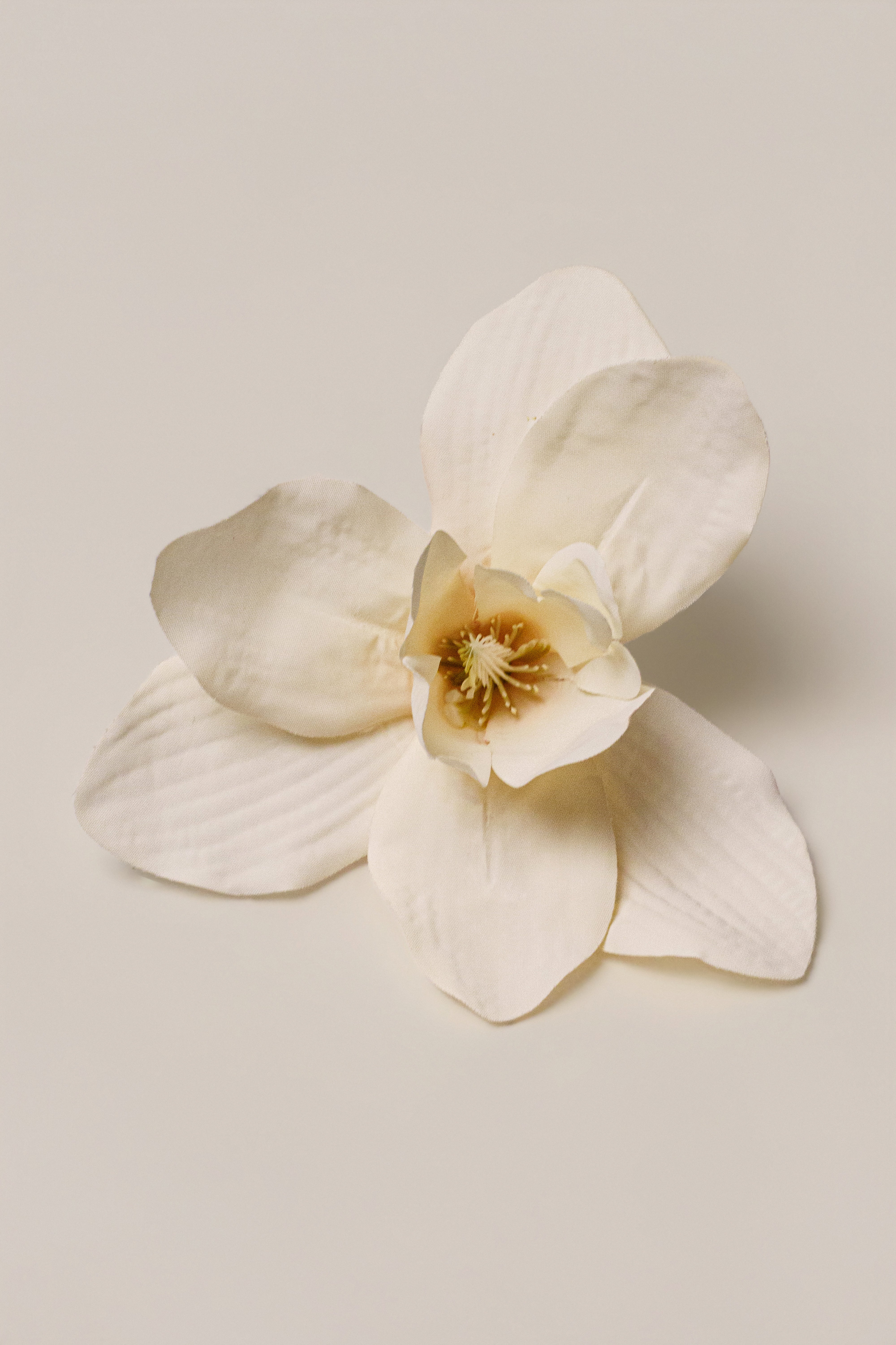 Ivory coastal orchid hair clip by JLUXLABEL, elegant accessories with a floral design, ideal for adding a touch of style to hairstyles.
