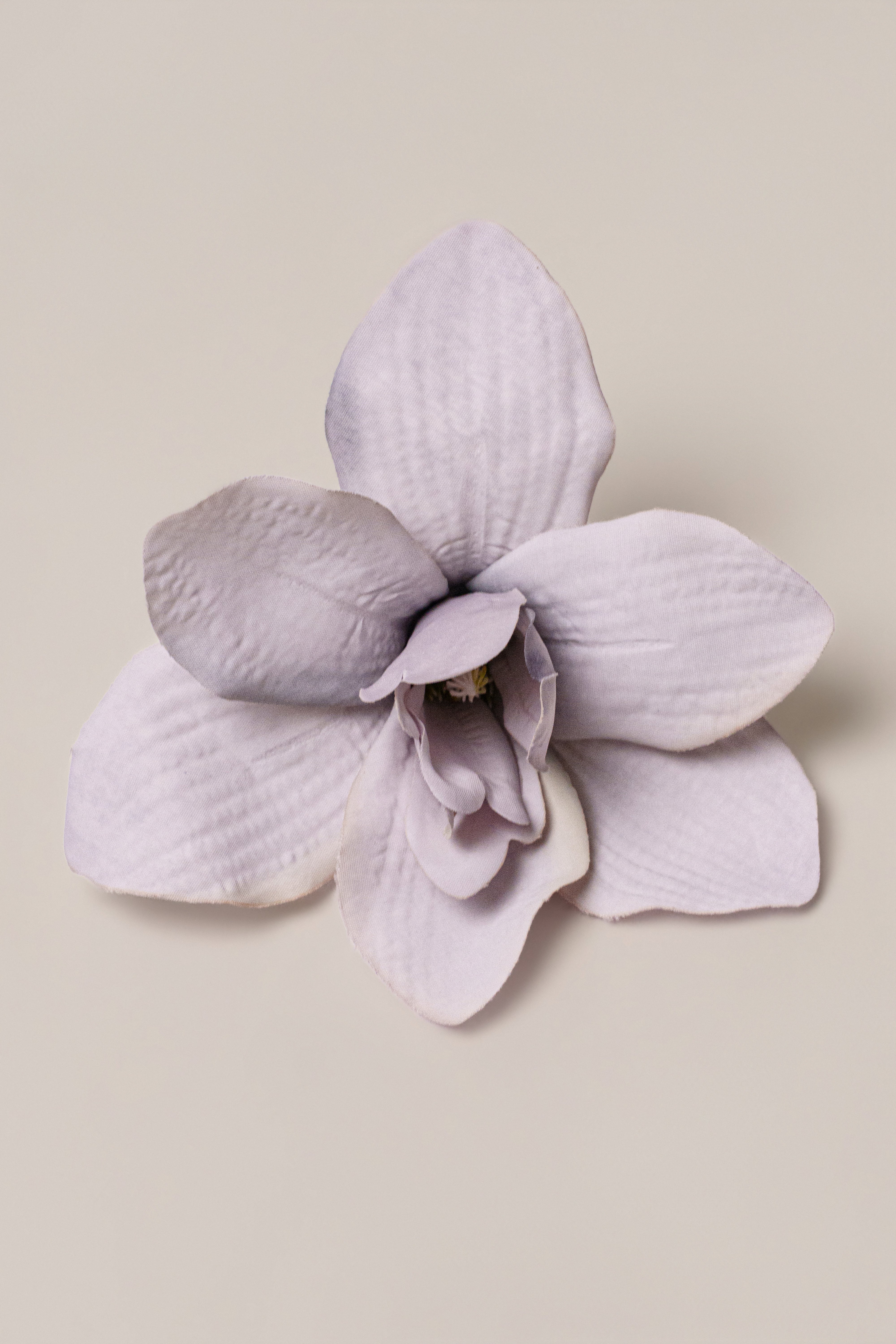 Purple Coastal Orchid hair clip from JLUXLABEL, stylish accessories featuring a vibrant floral design with a gold-tone clasp.