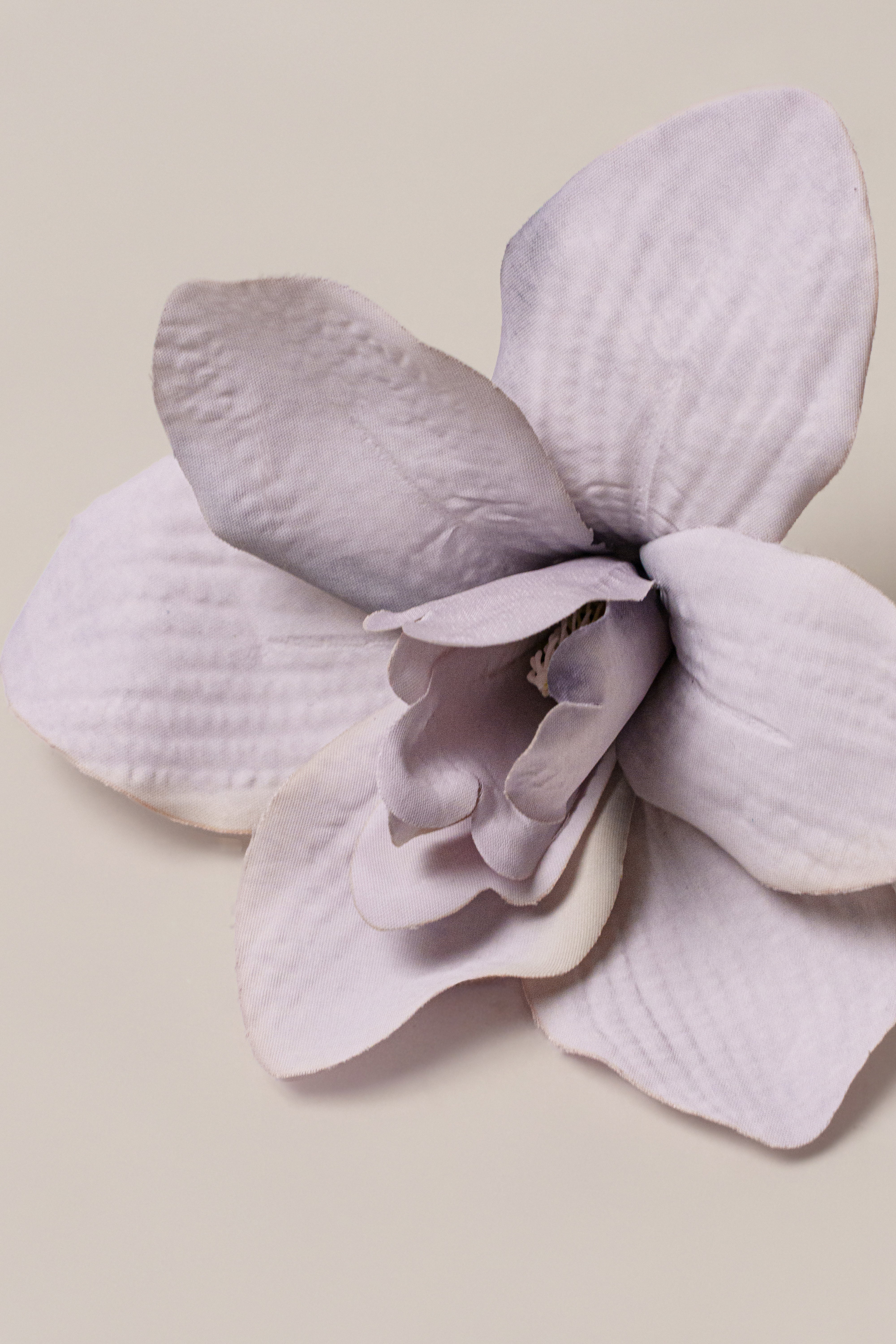 Purple coastal orchid hair clip from JLUXLABEL, a stylish accessory with a vibrant orchid design for hair decoration.