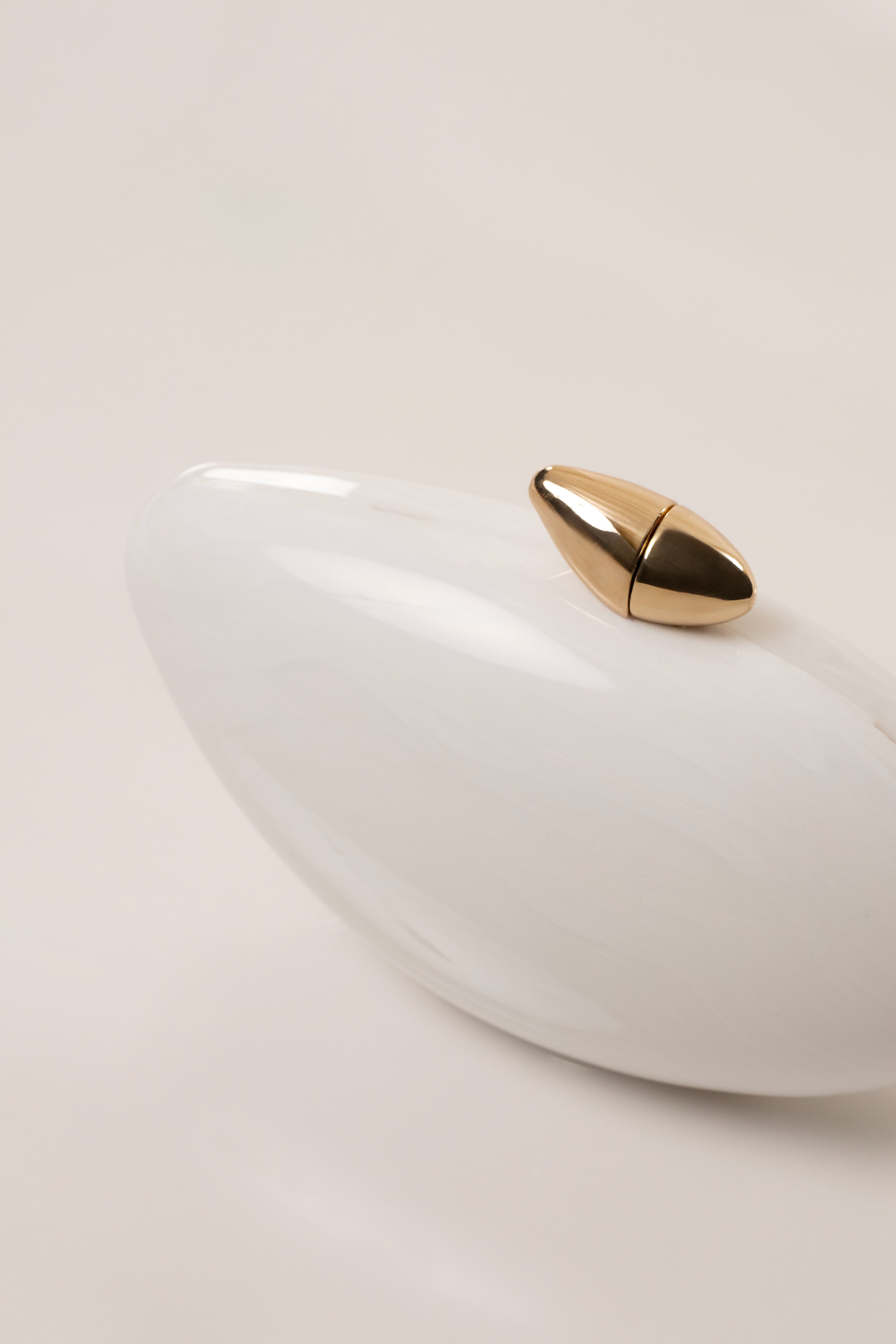 White Sea Muse Pearl Clutch accessory by JLUXLABEL with pearl embellishments and sleek design, perfect for elegant occasions.