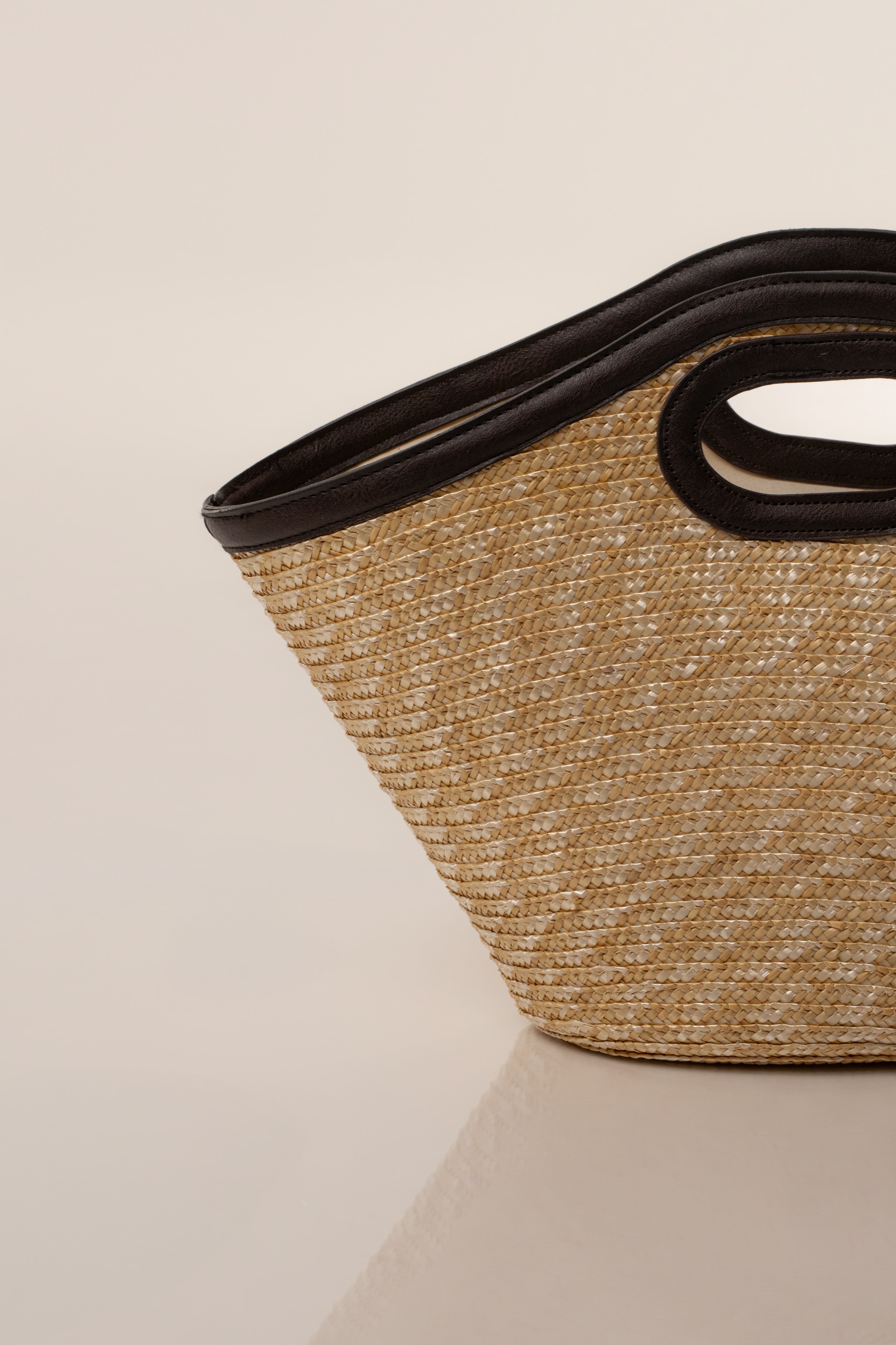Natural Santorini straw tote bag by JLUXLABEL with woven straw design and leather handles for stylish summer accessories.